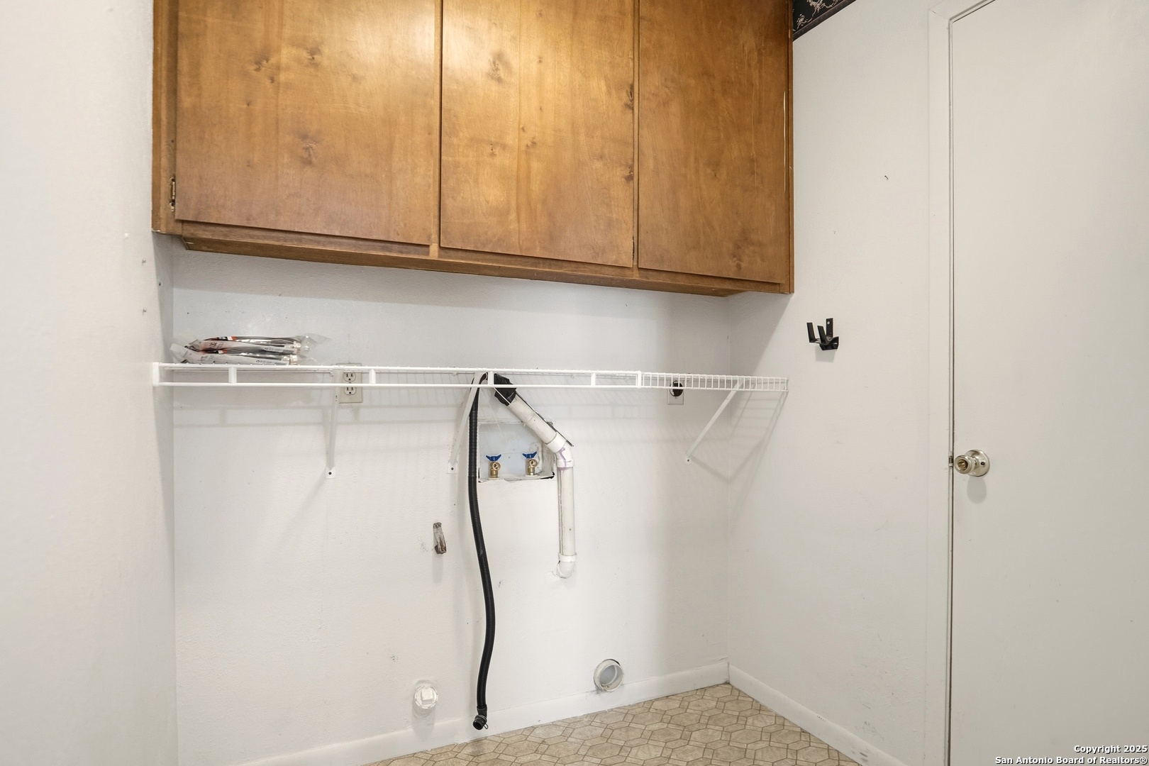 261 Fawn Lane Spring Branch, TX 78070 - Photo 23 of 36 a view of small space with racks on the wall