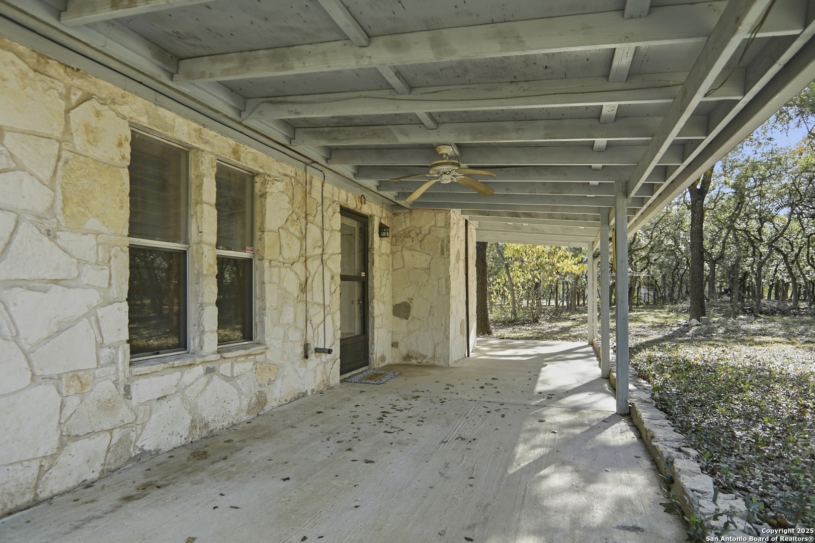 261 Fawn Lane Spring Branch, TX 78070 - Photo 24 of 36 a view of a porch with hardwood