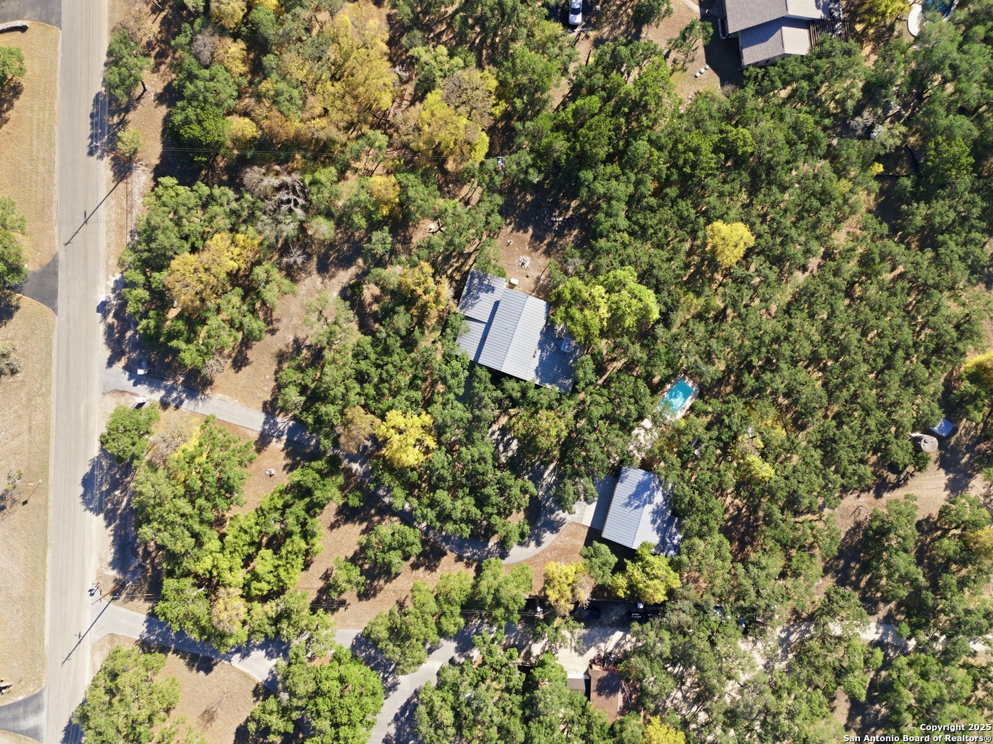 261 Fawn Lane Spring Branch, TX 78070 - Photo 29 of 36 an aerial view of a house with a yard and garden