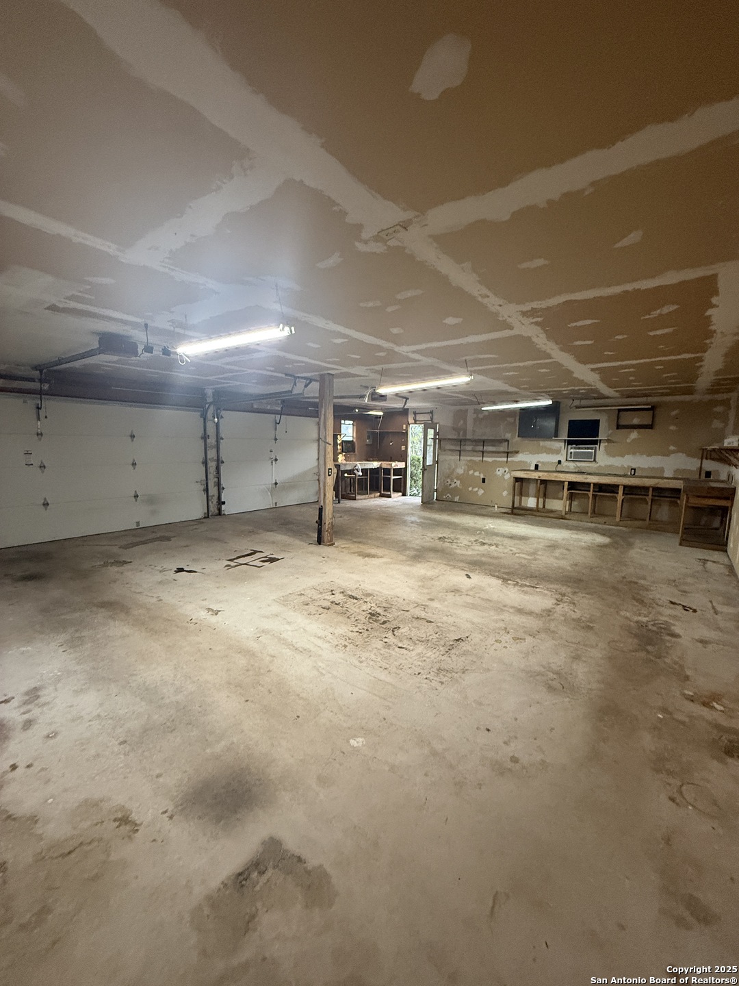 261 Fawn Lane Spring Branch, TX 78070 - Photo 31 of 36 a view of a empty room with a garage