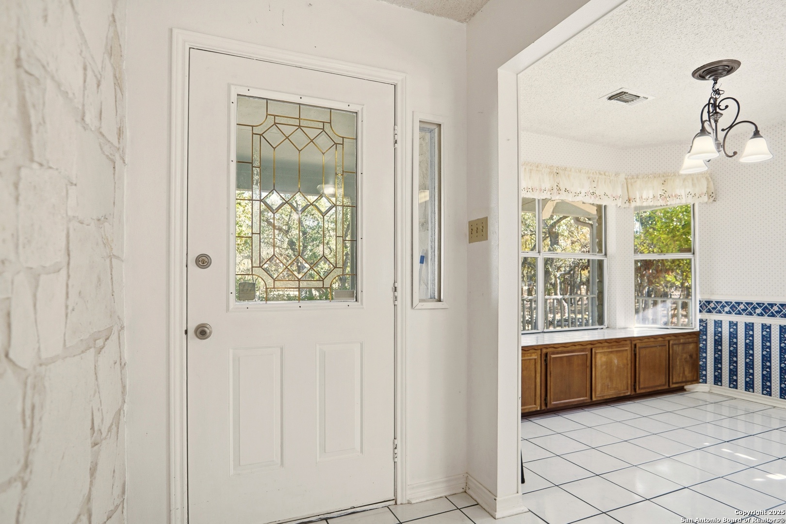 261 Fawn Lane Spring Branch, TX 78070 - Photo 4 of 36 a view of a hallway with windows and stairs