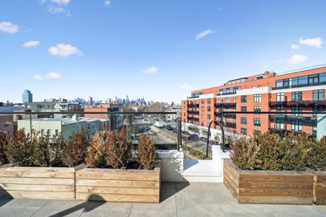 12 Broome Street, Unit 3B Brooklyn, NY 11222 - Photo 12 of 14 a view of a lake