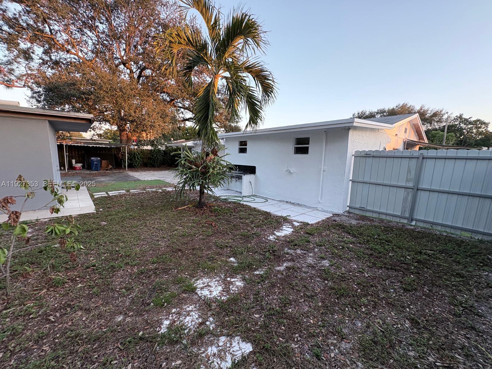 3821 Northwest 208th Street Miami Gardens, FL 33055 - Photo 23 of 23 a view of a backyard
