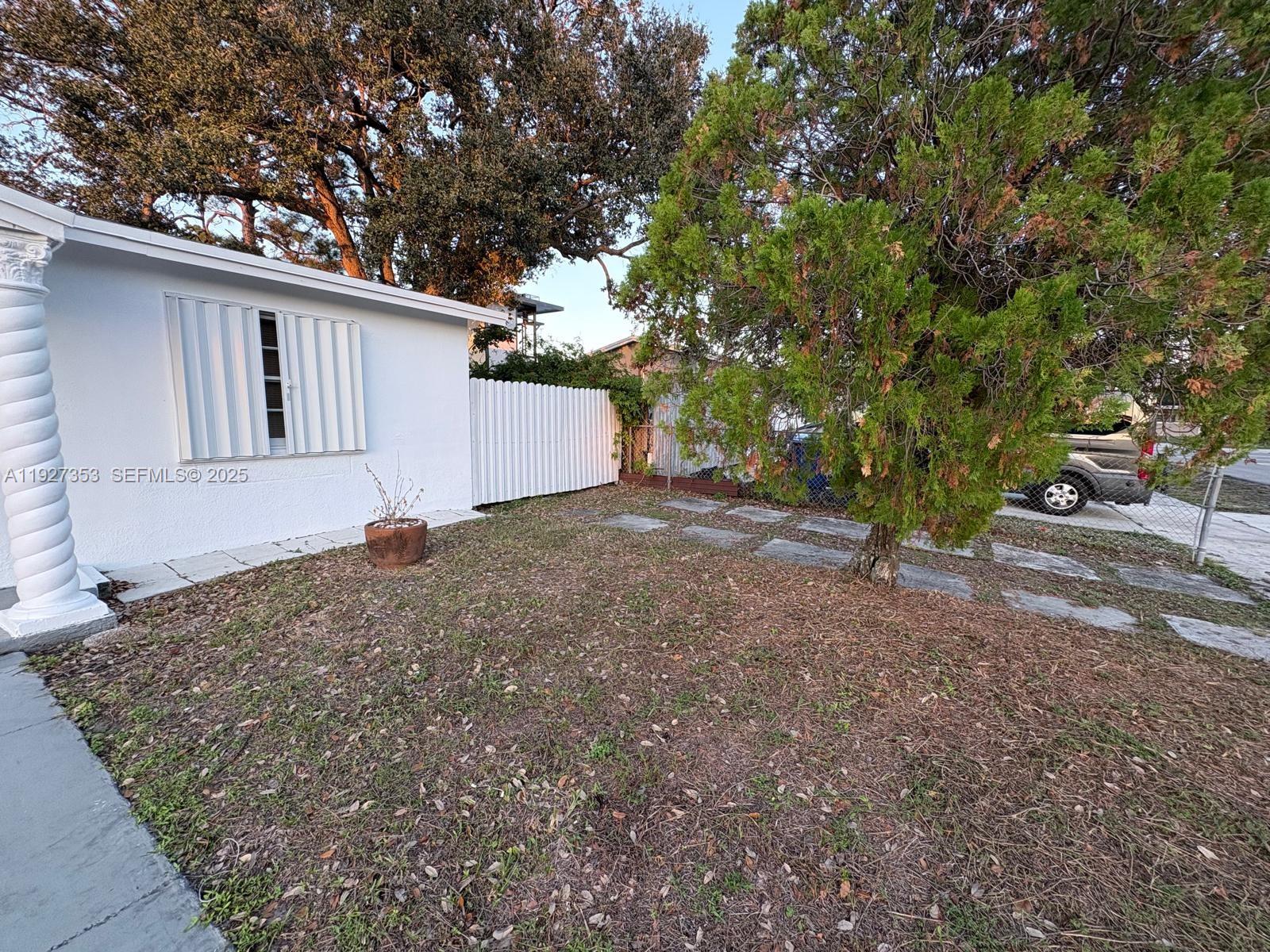 3821 Northwest 208th Street Miami Gardens, FL 33055 - Photo 5 of 23 a view of a house with a tree