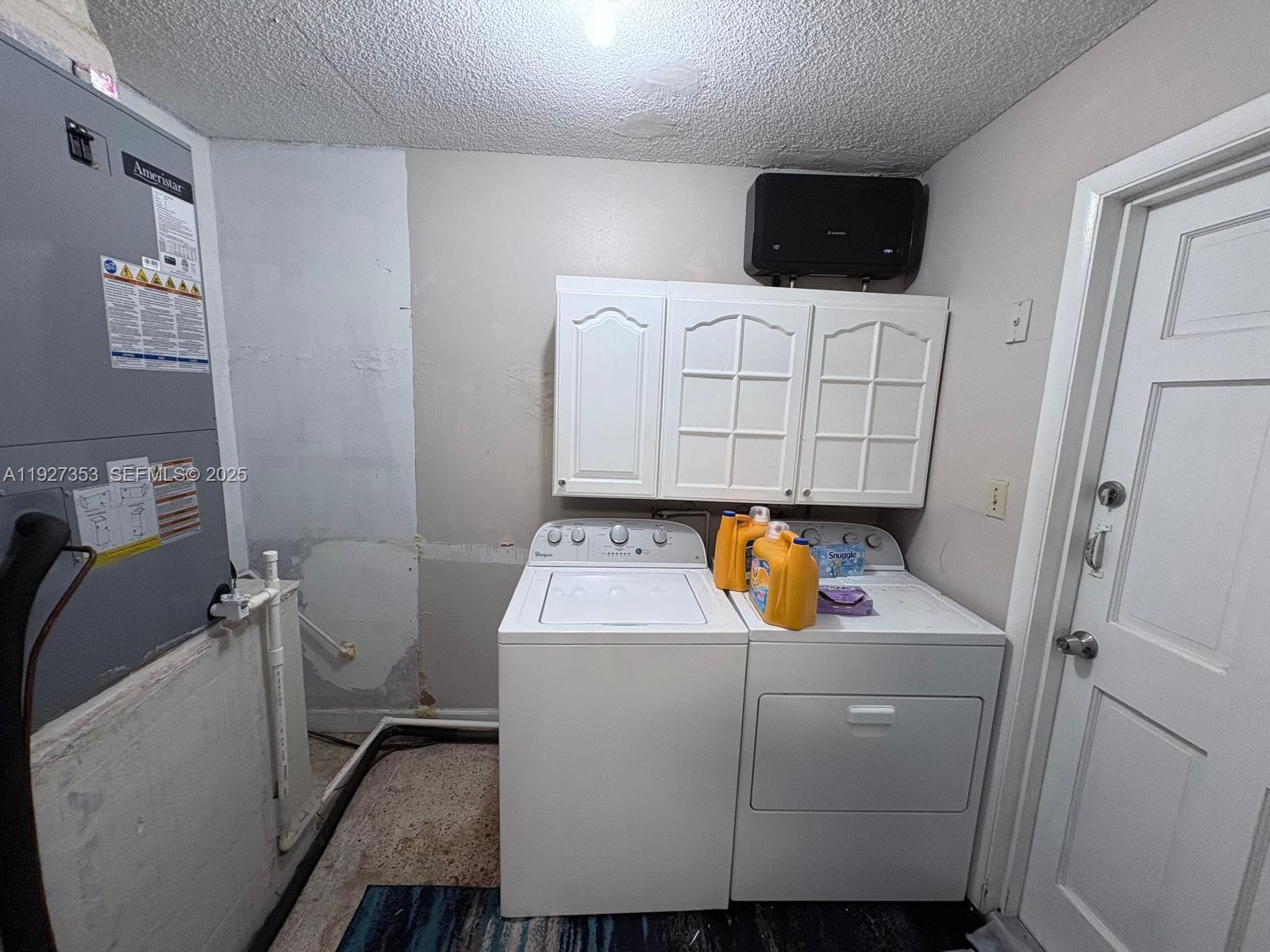 3821 Northwest 208th Street Miami Gardens, FL 33055 - Photo 9 of 23 a utility room with dryer and washer