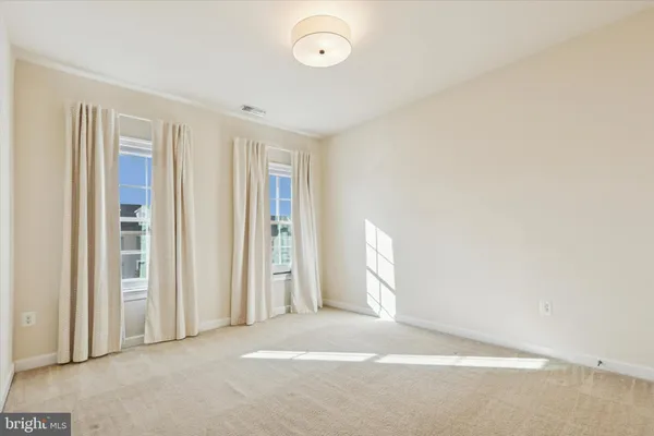 a view of a room with an empty space
