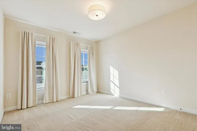 a view of a room with an empty space