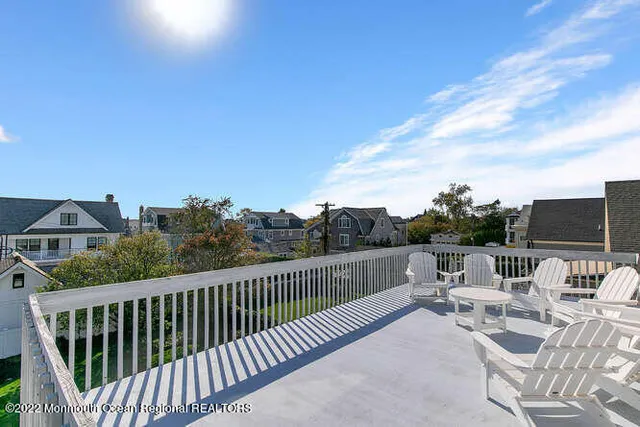 a view of a chairs and table on the terrace