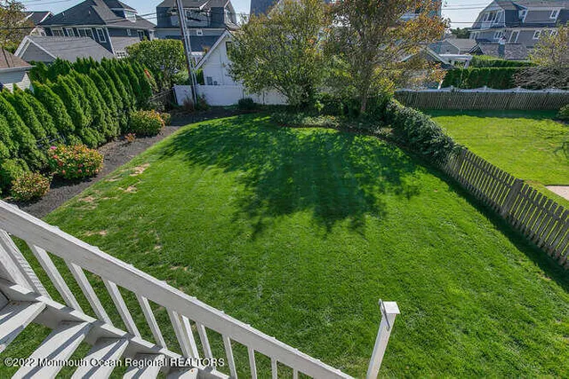 a view of a backyard with plants
