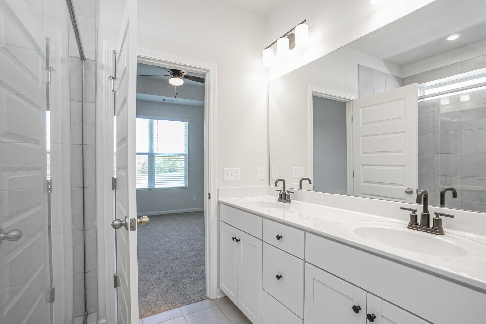 2525 Pleasant Ridge Run Mount Juliet, TN 37122 - Photo 11 of 27 a bathroom with double sink and a mirror