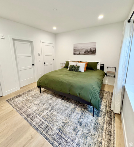 70 East Hwy 153, Unit A4 Beaver, UT 84713 - Photo 7 of 19 Bedroom featuring wood finished floors and recessed lighting