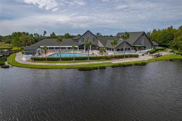 a view of a golf course with a lake