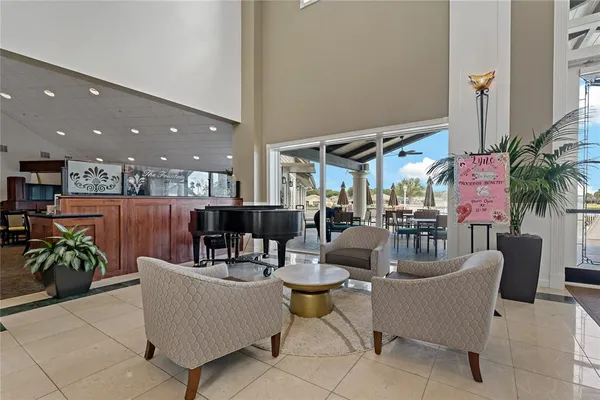 a view of house with a yard and swimming pool
