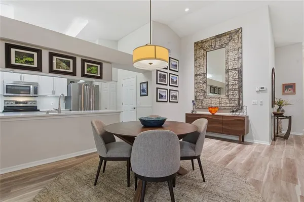 a kitchen with stainless steel appliances granite countertop a lot of counter top space and cabinets