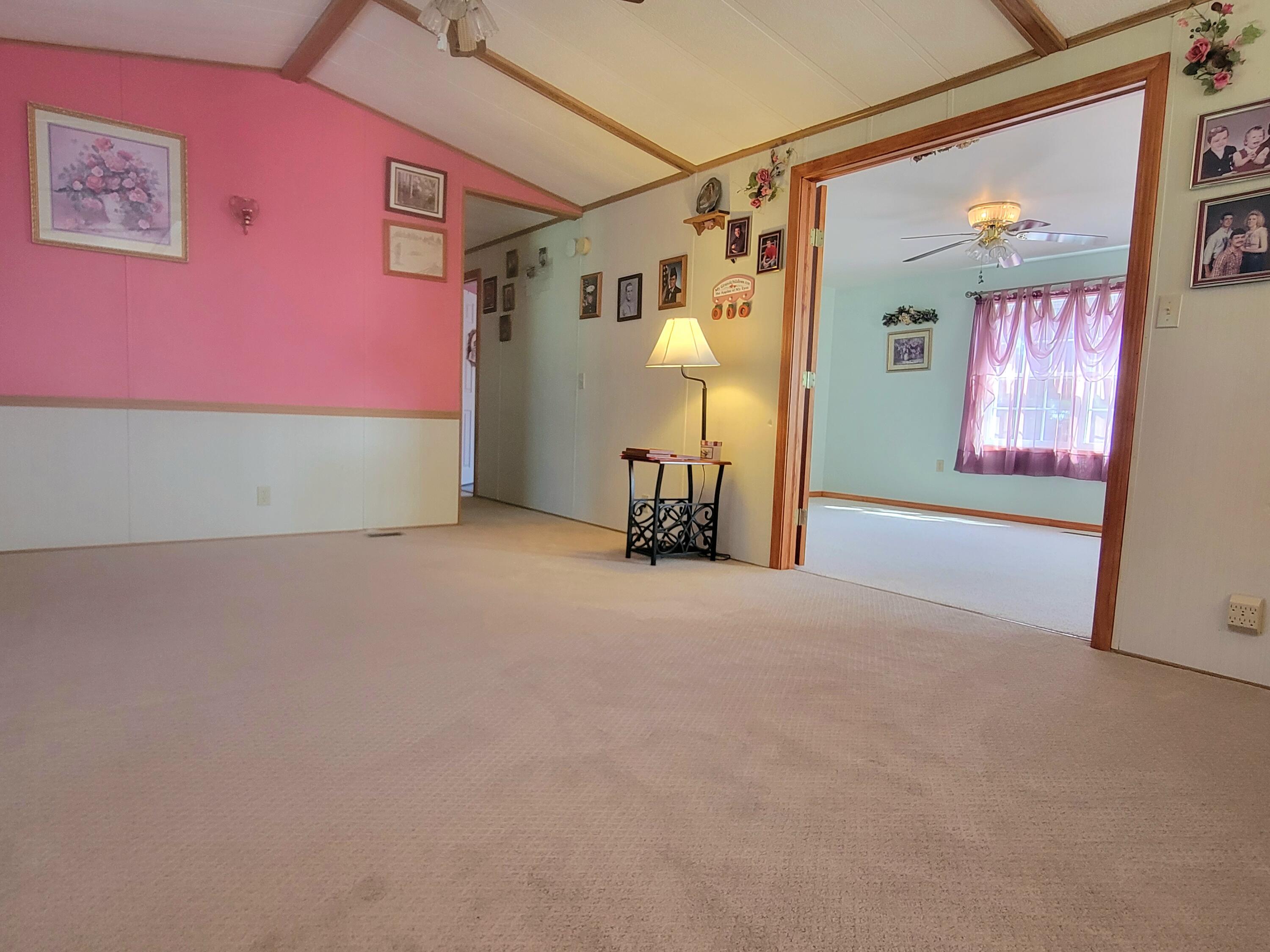 5416 Bennoch Road Lagrange, ME 04453 - Photo 19 of 32 Living Room Area
