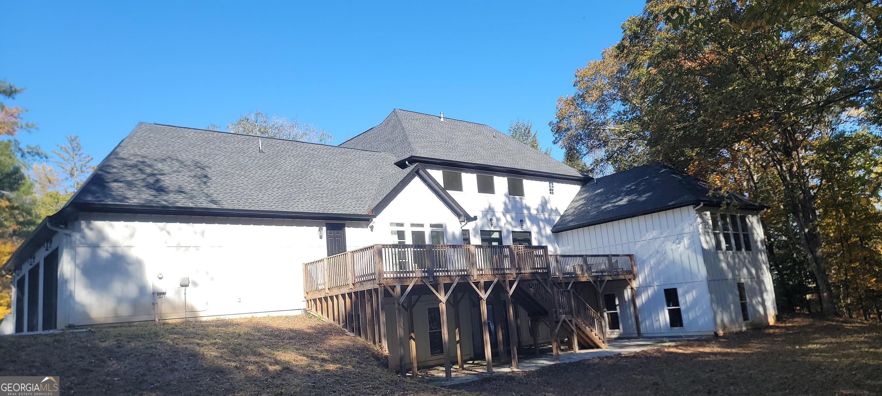 4032 Wesley Chapel Road Roswell, GA 30075 - Photo 32 of 36 a view of a house with a tree