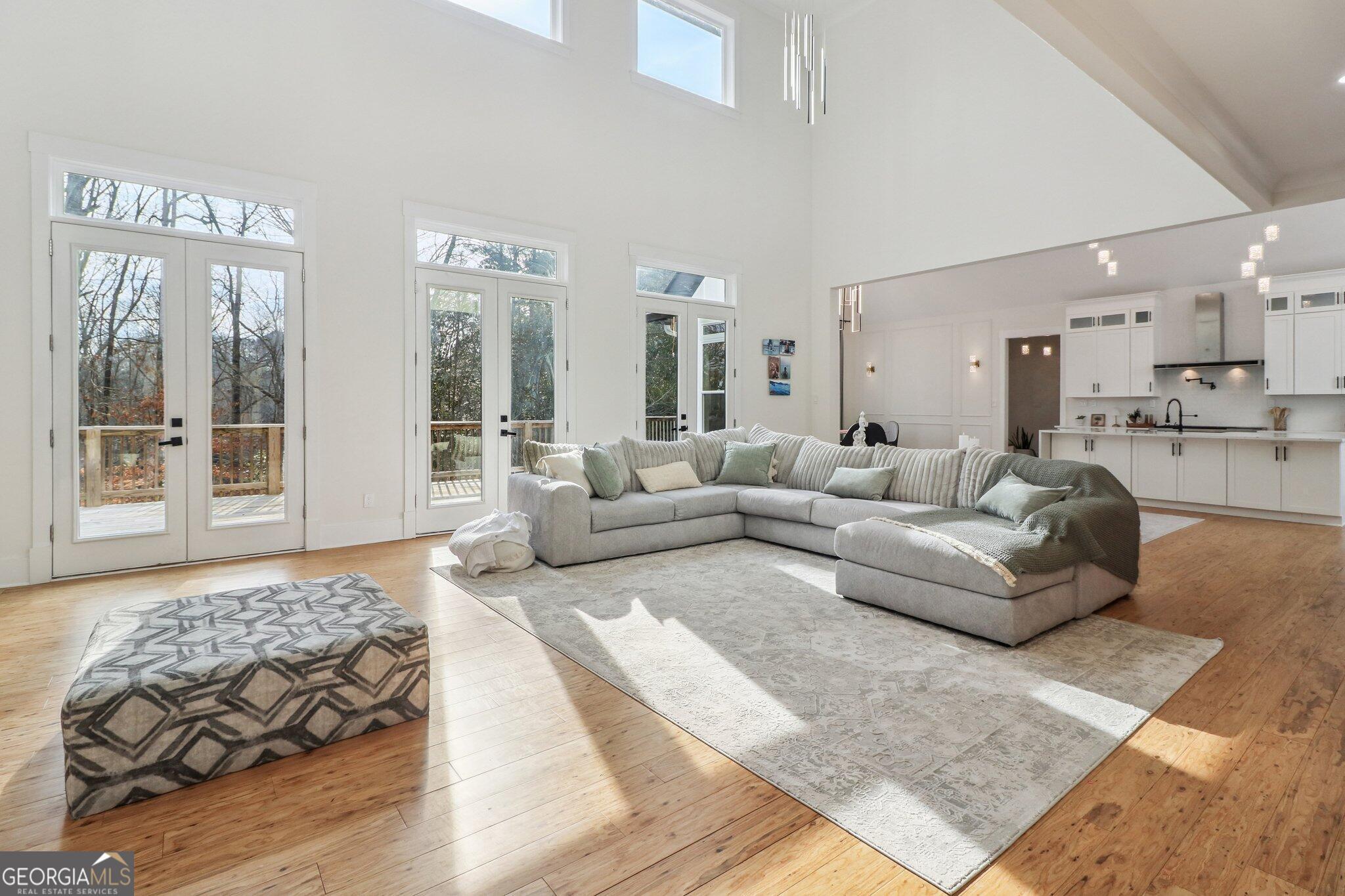 4032 Wesley Chapel Road Roswell, GA 30075 - Photo 6 of 36 a living room with furniture and a rug