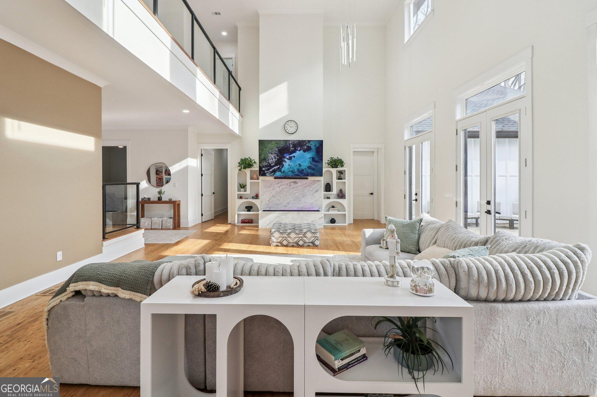 4032 Wesley Chapel Road Roswell, GA 30075 - Photo 9 of 36 a living room with furniture and a flat screen tv