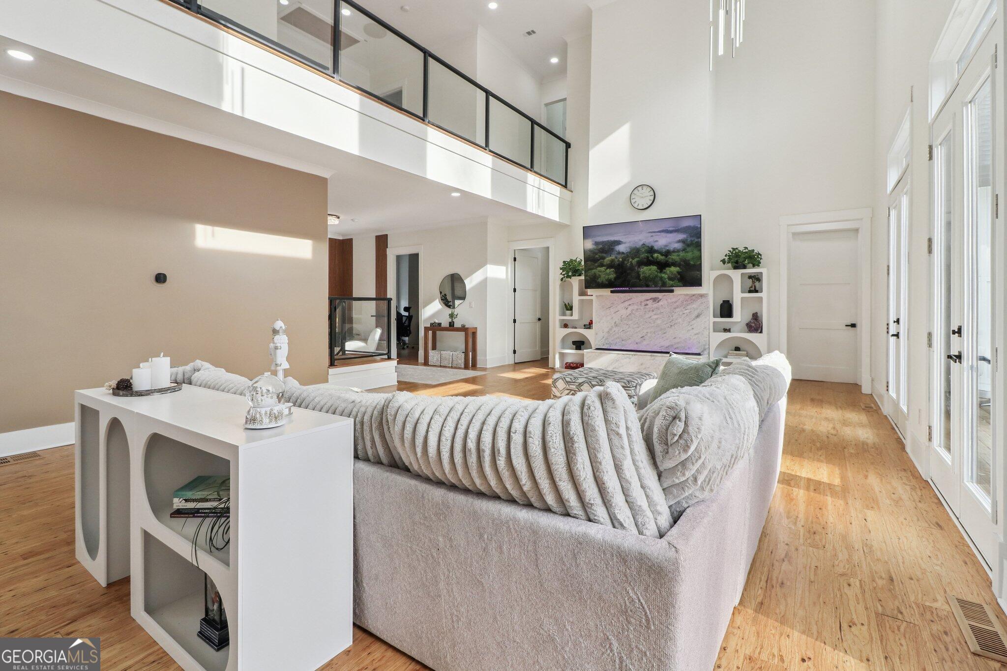 4032 Wesley Chapel Road Roswell, GA 30075 - Photo 10 of 36 a bed room with a bed and a couch