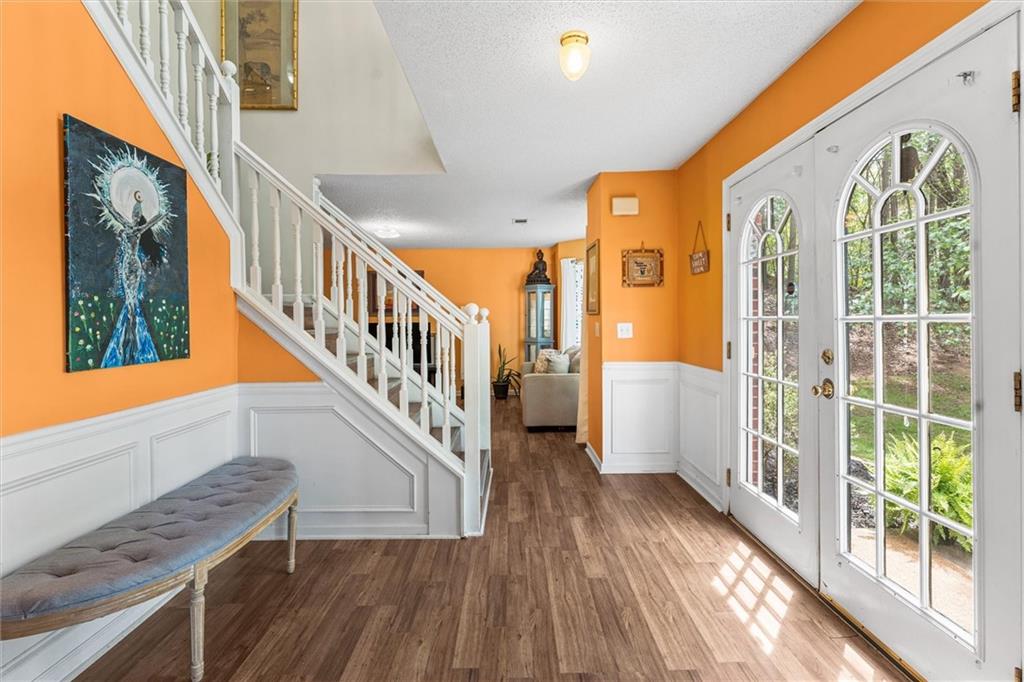 3234 Mineral Ridge Lane Stone Mountain, GA 30087 - Photo 4 of 55 a view of an entryway with wooden floor