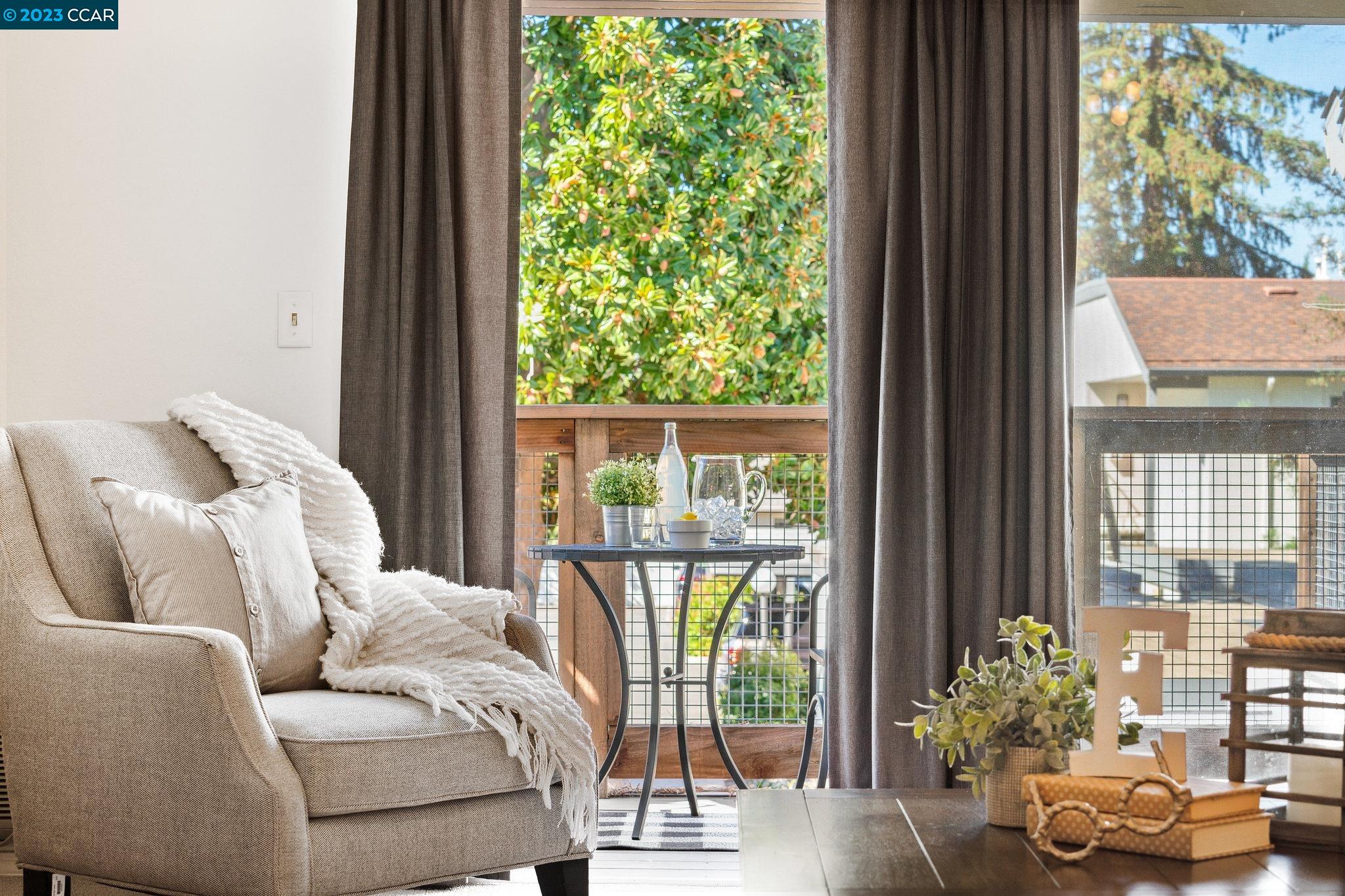 4081 Clayton Road, Unit 205 Concord, CA 94521 - Photo 1 of 1 a living room with furniture and a window