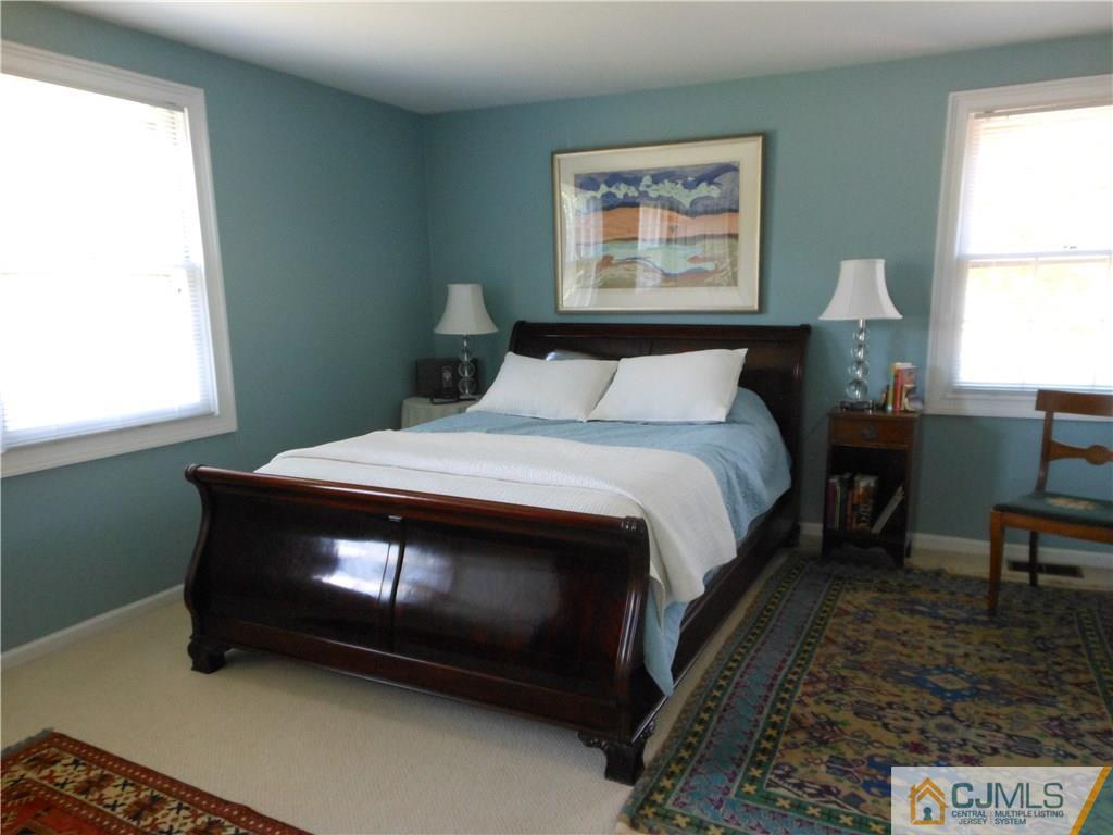34 MacAfee Road Somerset, NJ 08873 - Photo 8 of 17 a bedroom with a bed and a window