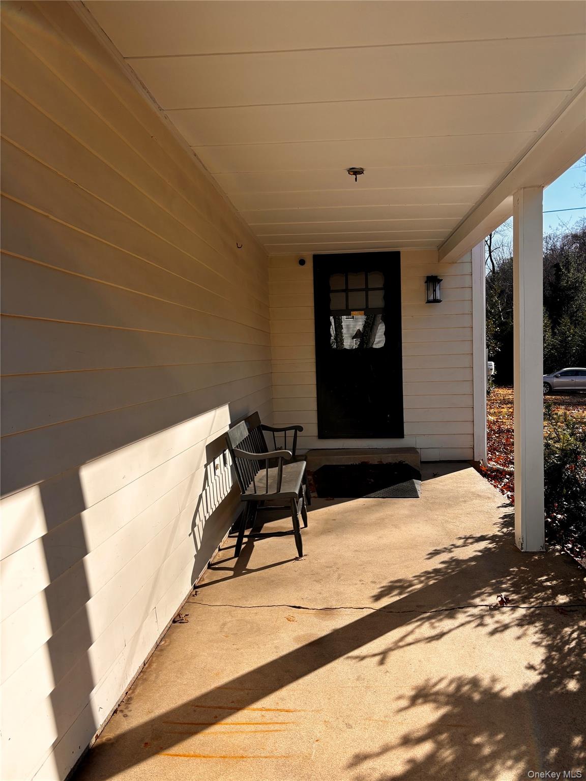 67 Turkey Lane Cold Spring Harbor, NY 11724 - Photo 2 of 18 a view of an chairs and tables in the room