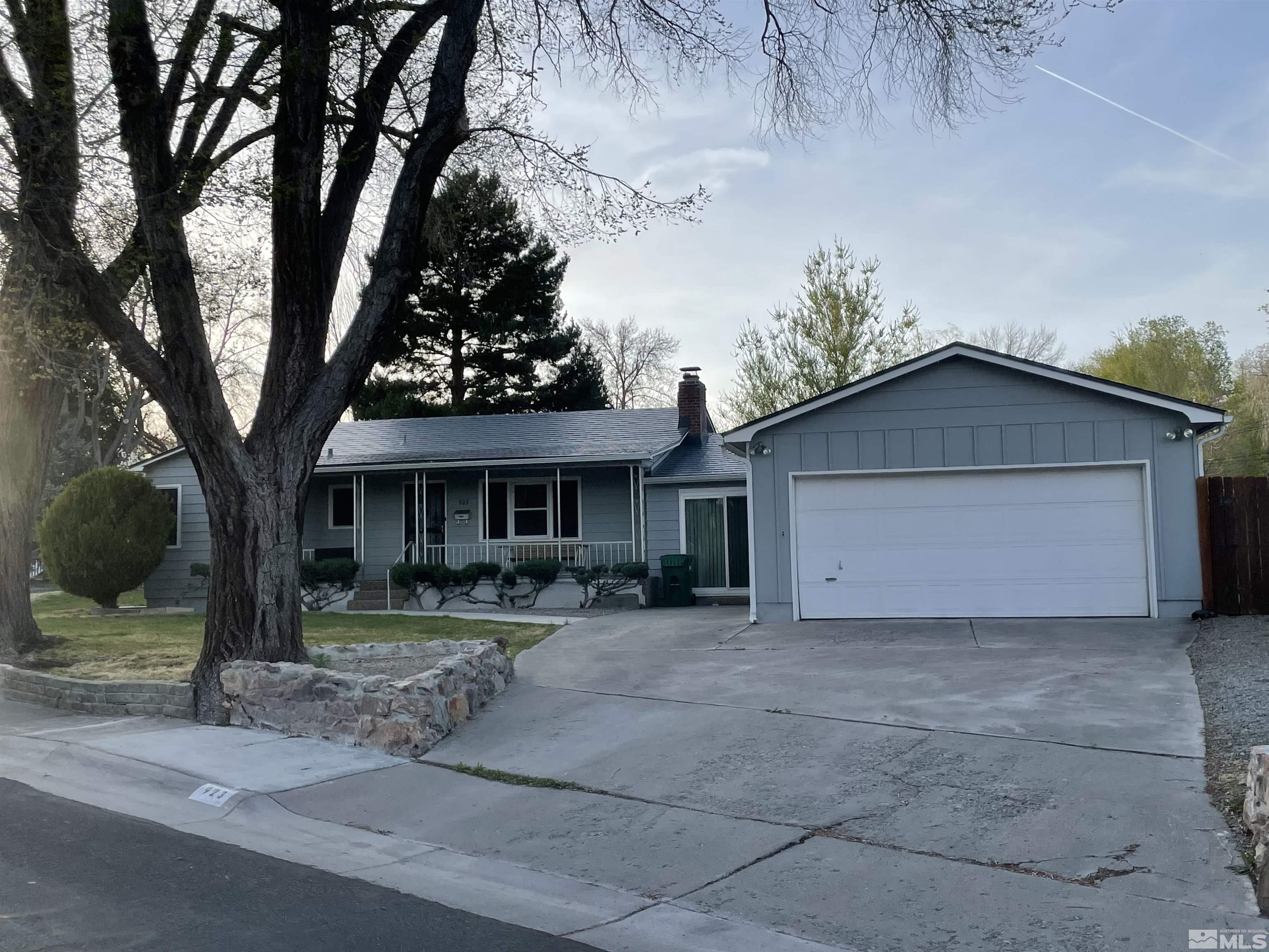 923 University Terrace Reno, NV 89503 - Photo 1 of 13 a front view of a house with garden