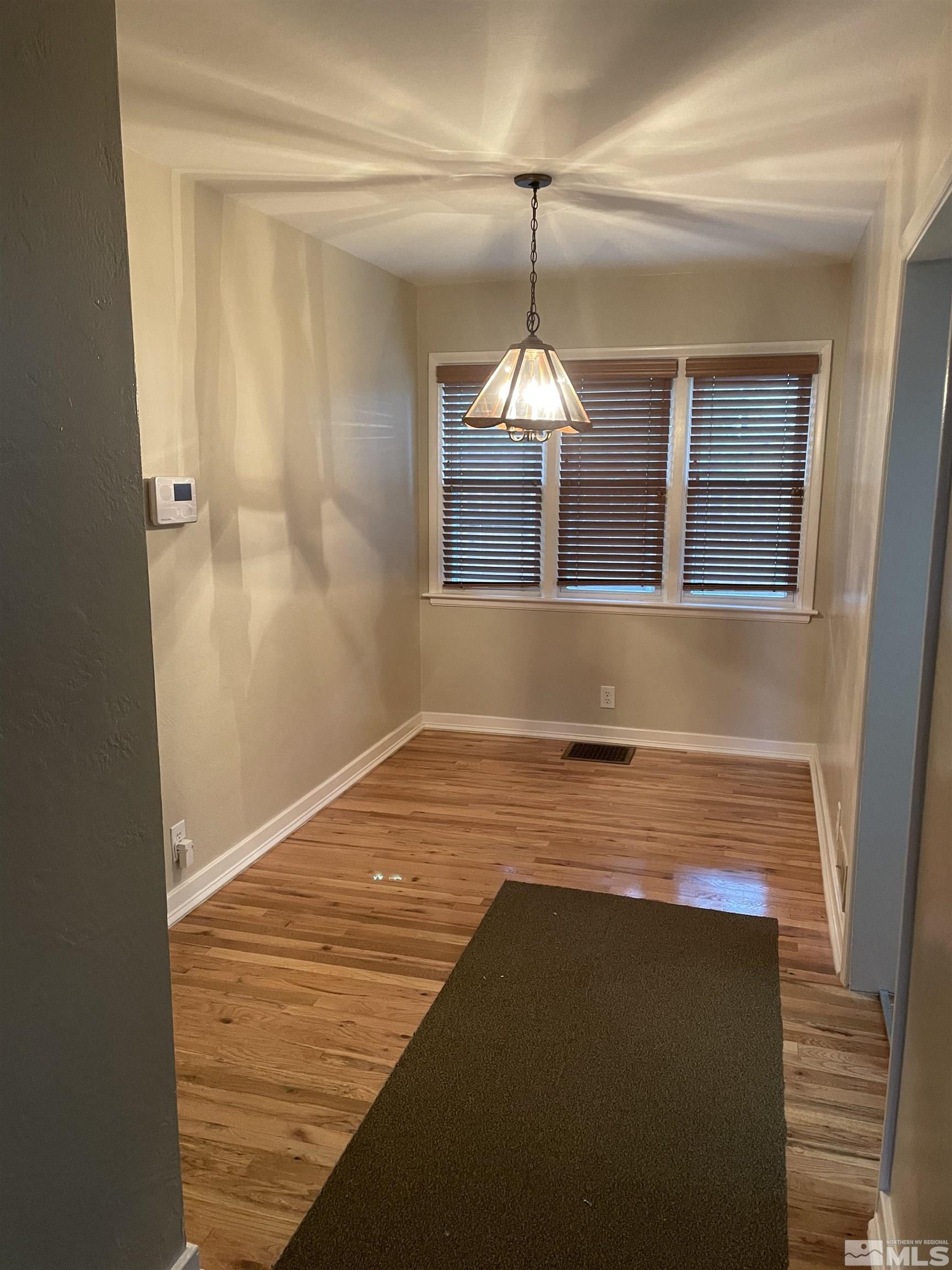 923 University Terrace Reno, NV 89503 - Photo 4 of 13 a view of an empty room and window