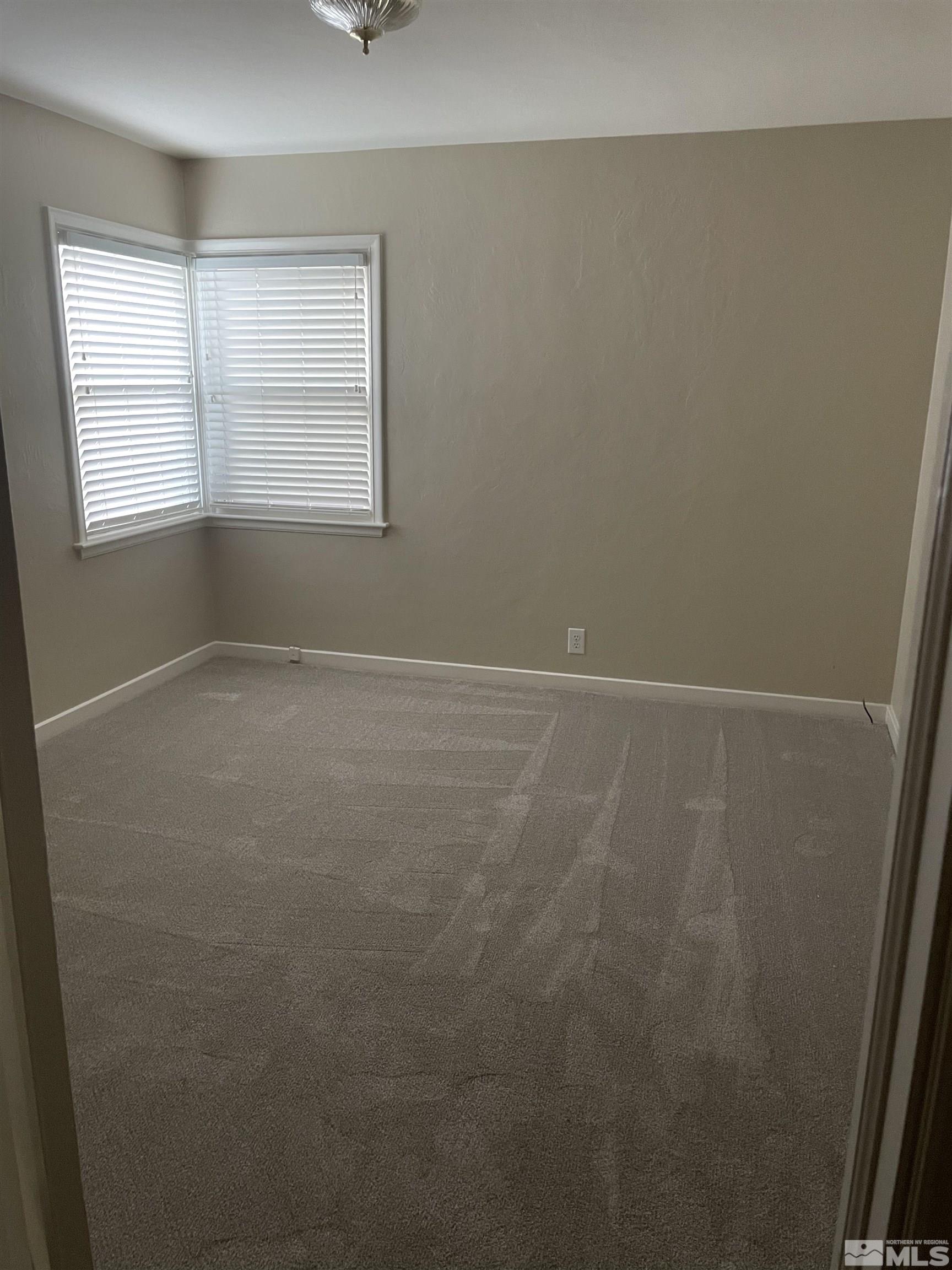 923 University Terrace Reno, NV 89503 - Photo 6 of 13 an empty room with windows