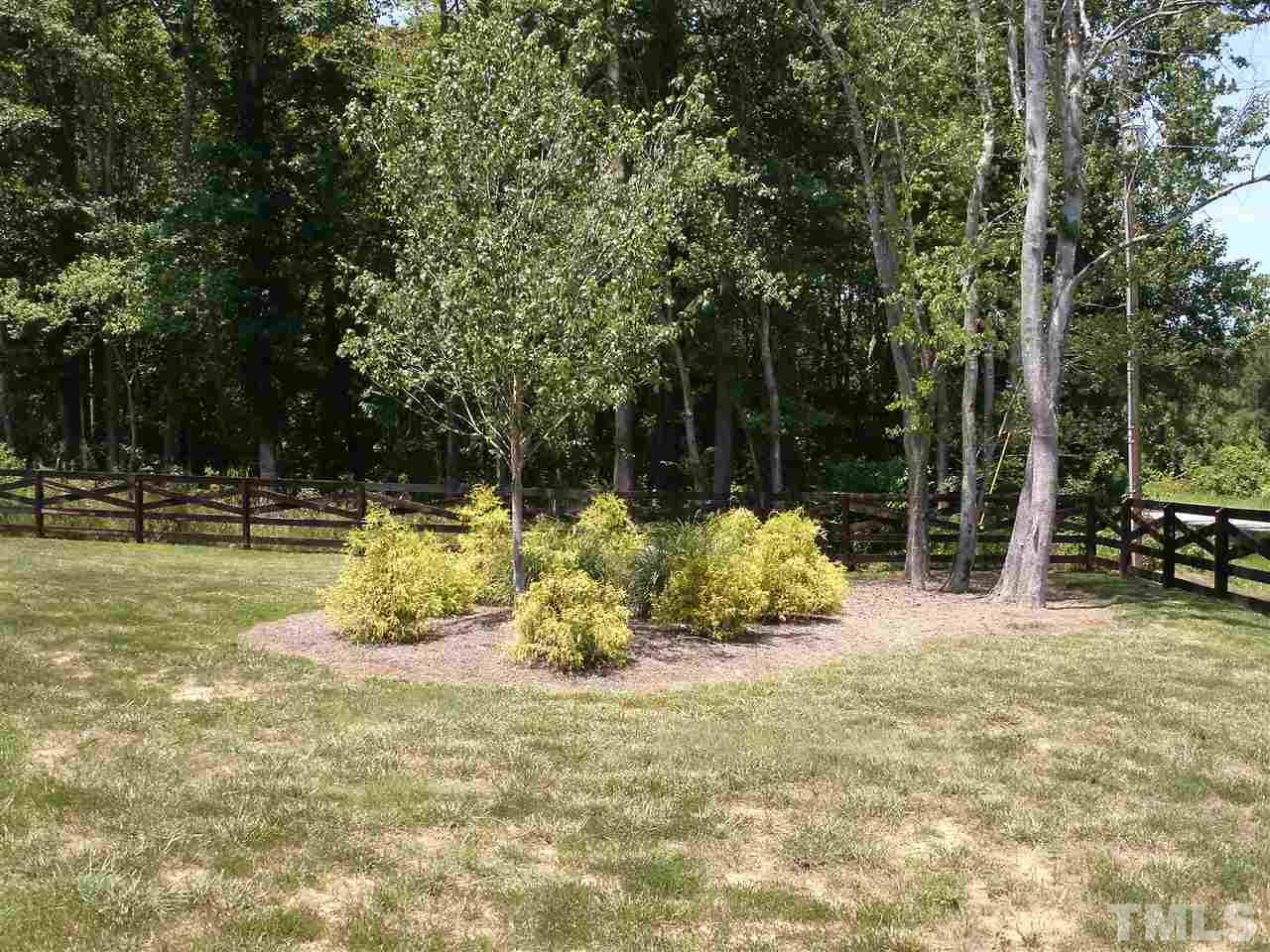 630 Tant Road Spring Hope, NC 27882 - Photo 24 of 25 Corner of front yard. Note fencing which surrounds the property.