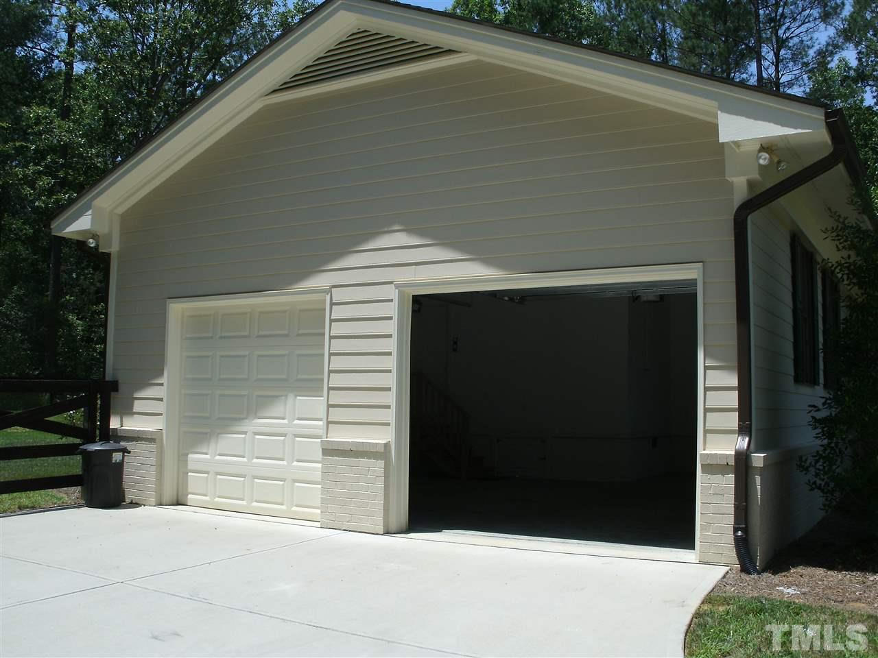 630 Tant Road Spring Hope, NC 27882 - Photo 4 of 25 Over sized garage. Concrete driveway.