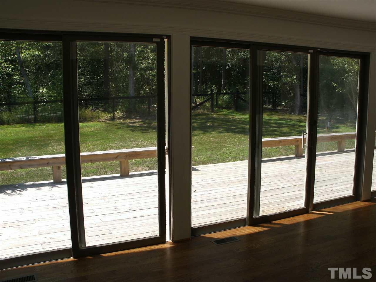630 Tant Road Spring Hope, NC 27882 - Photo 5 of 25 Four sliding doors for use to your deck.