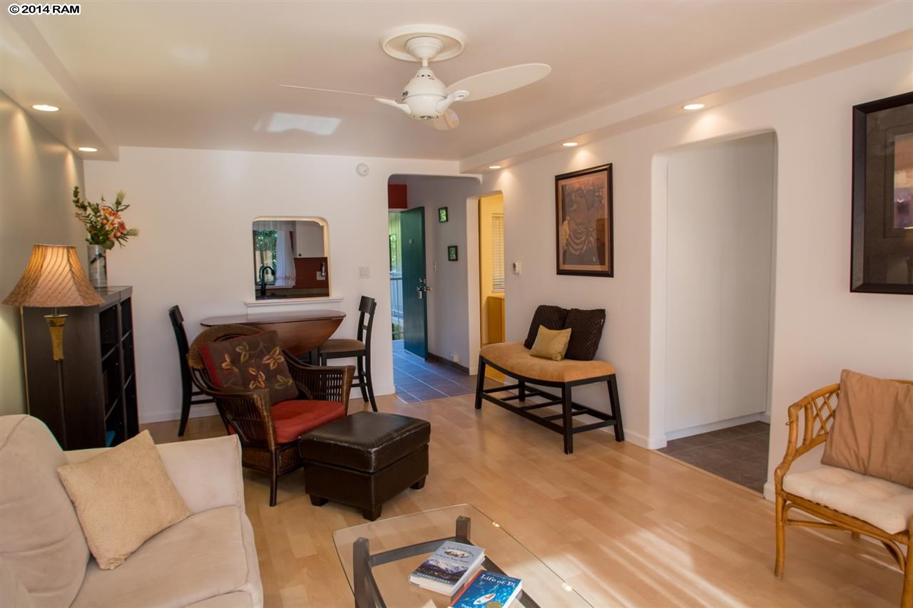 2219 South Kihei Road, Unit B214 Kihei, HI 96753 - Photo 9 of 20 a living room with furniture and a couch