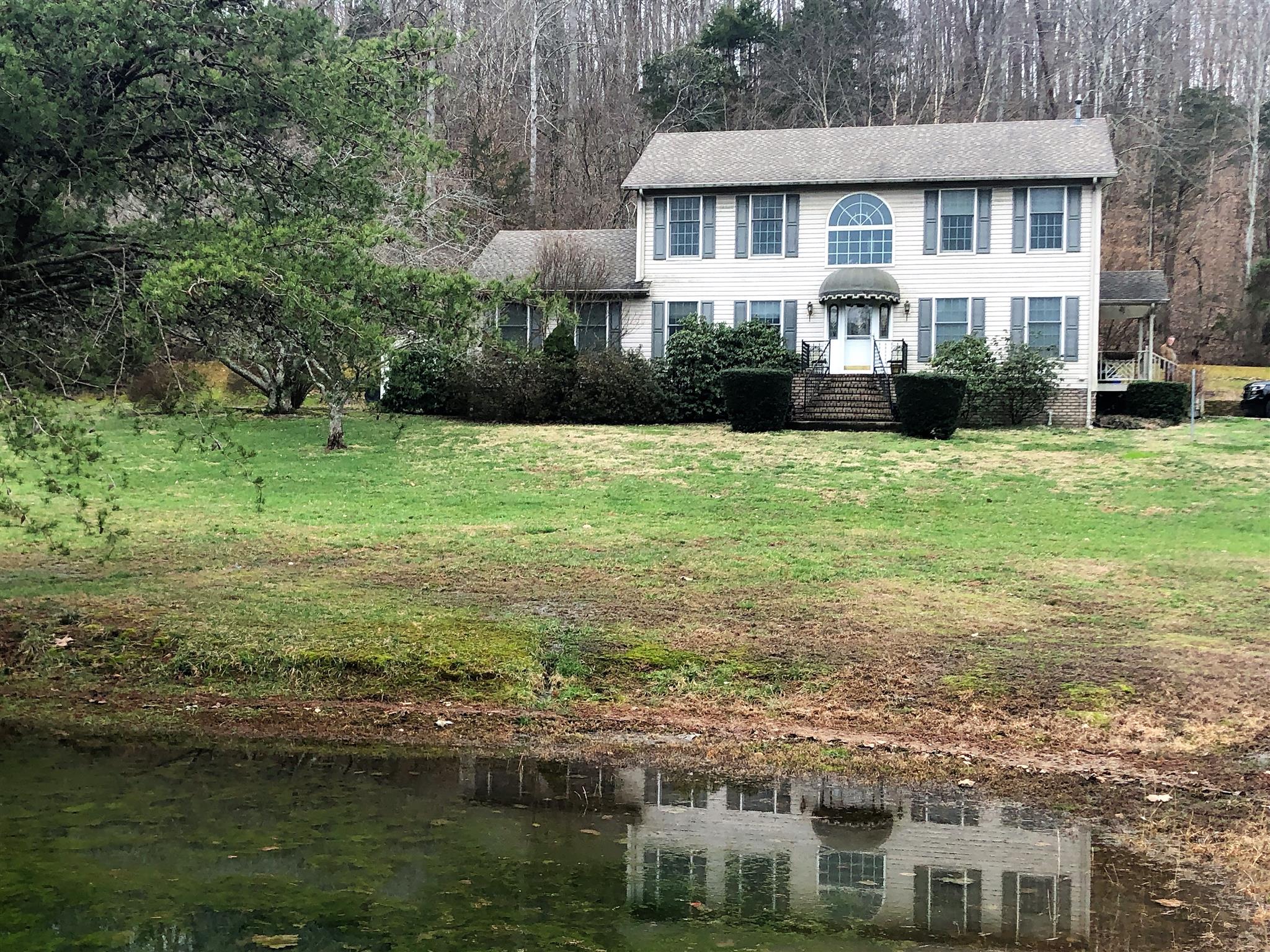 Beautiful Colonial overlooking the stocked pond