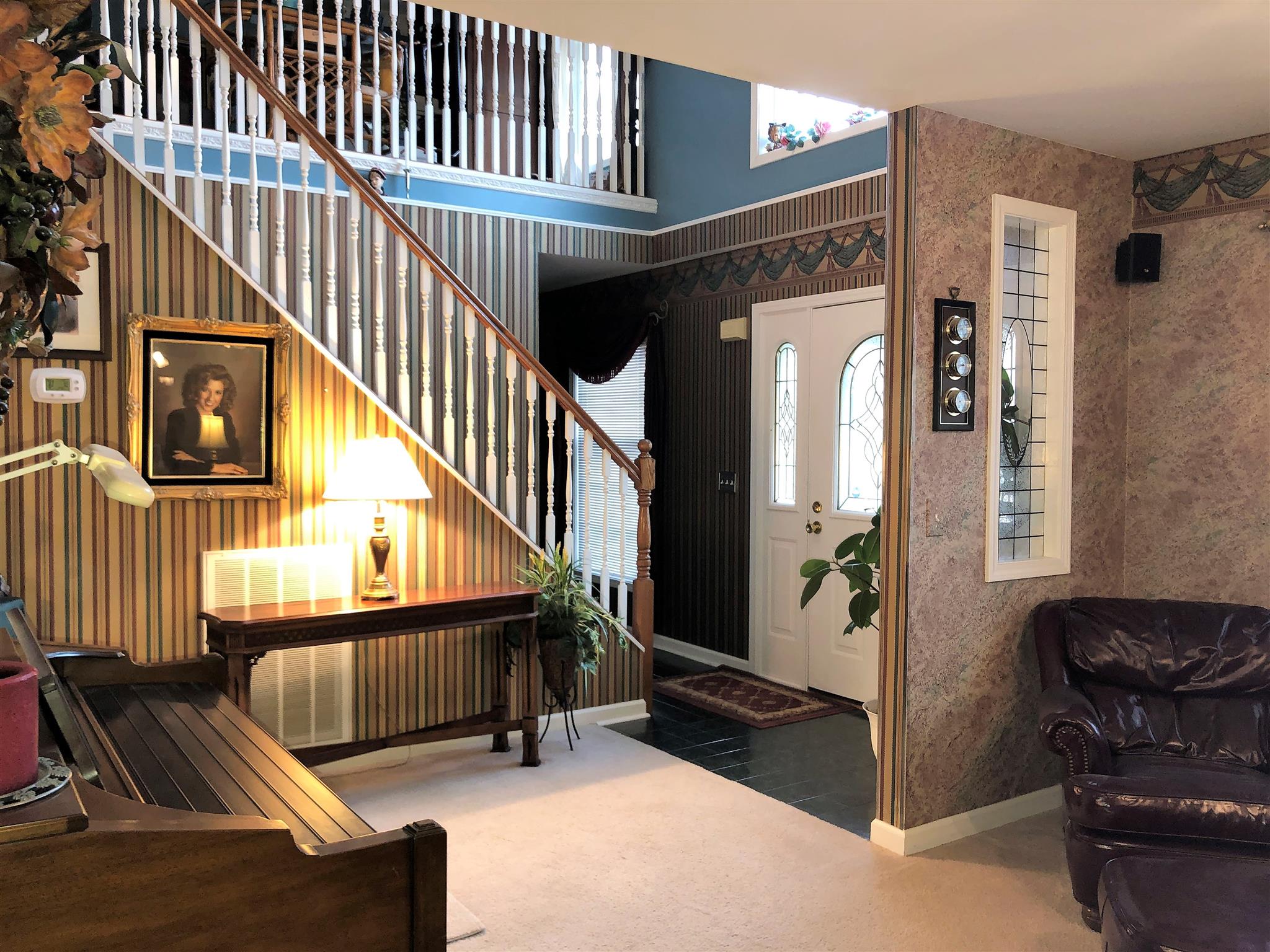 1099 Miller Road White Bluff, TN 37187 - Photo 8 of 30 This two story foyer welcomes your guest in a grand way.