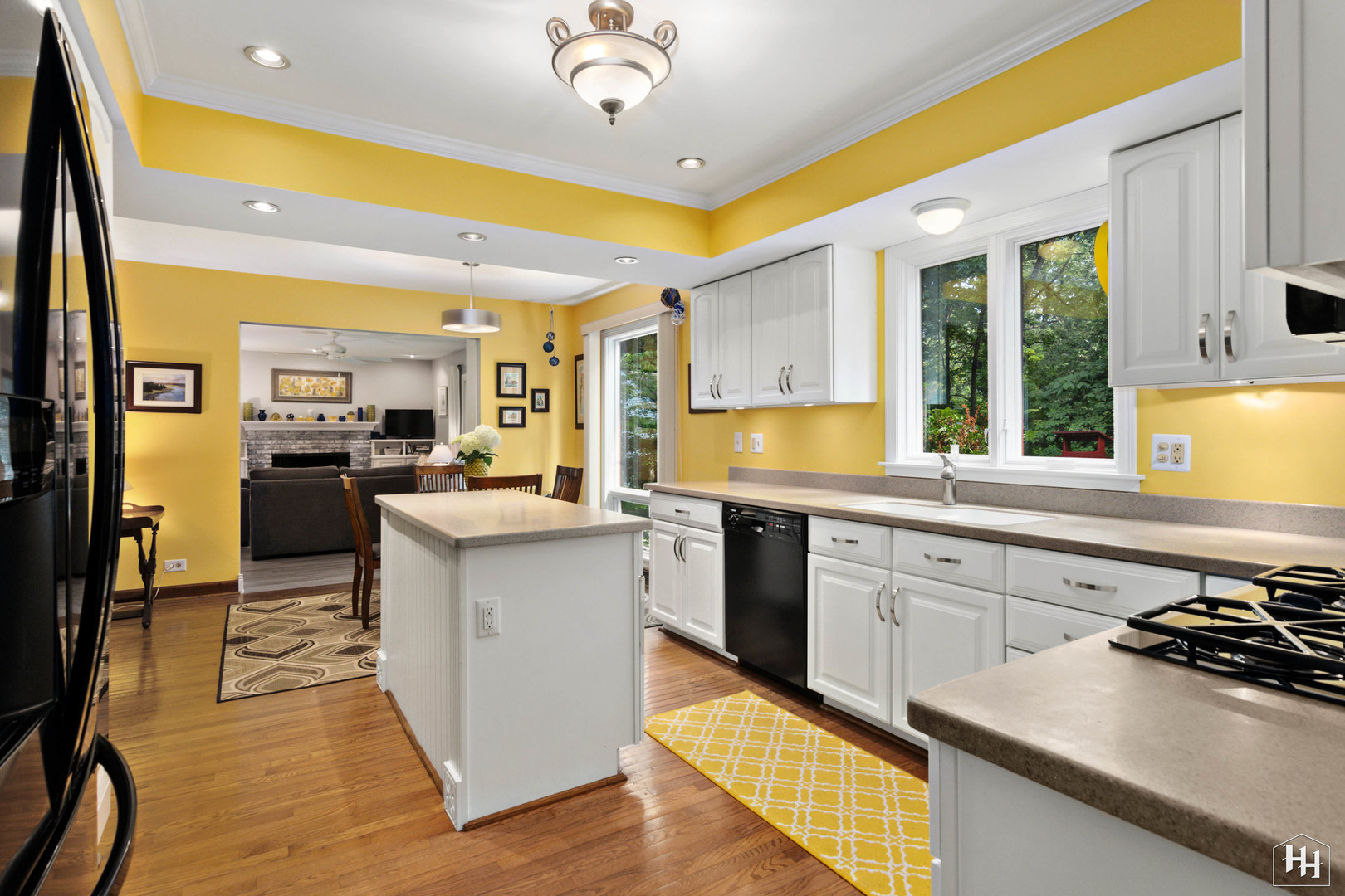 2275 Tara Drive Elgin, IL 60123 - Photo 11 of 33 a kitchen with stainless steel appliances granite countertop a sink and cabinets