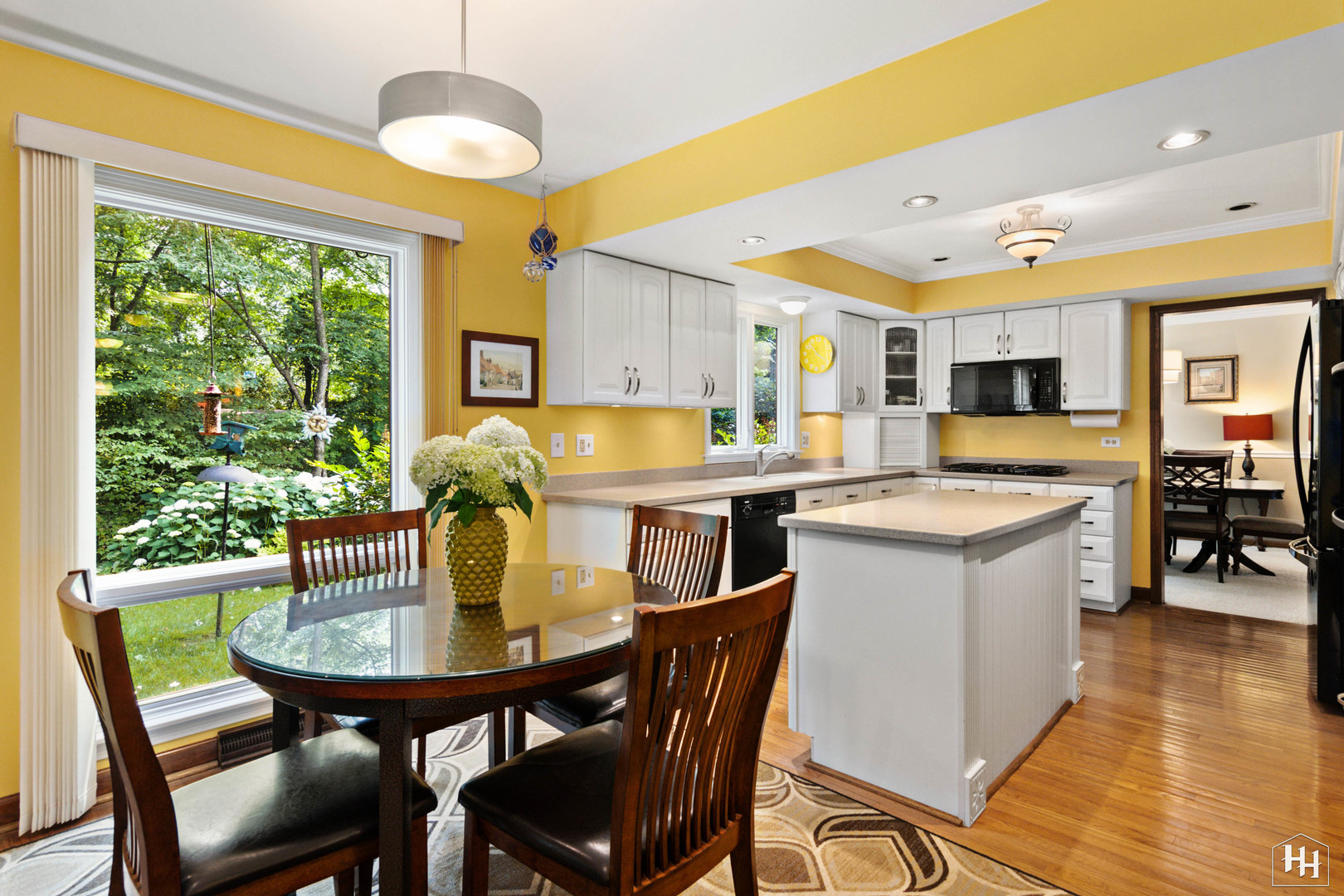 2275 Tara Drive Elgin, IL 60123 - Photo 14 of 33 a view of a dining room with furniture window and wooden floor