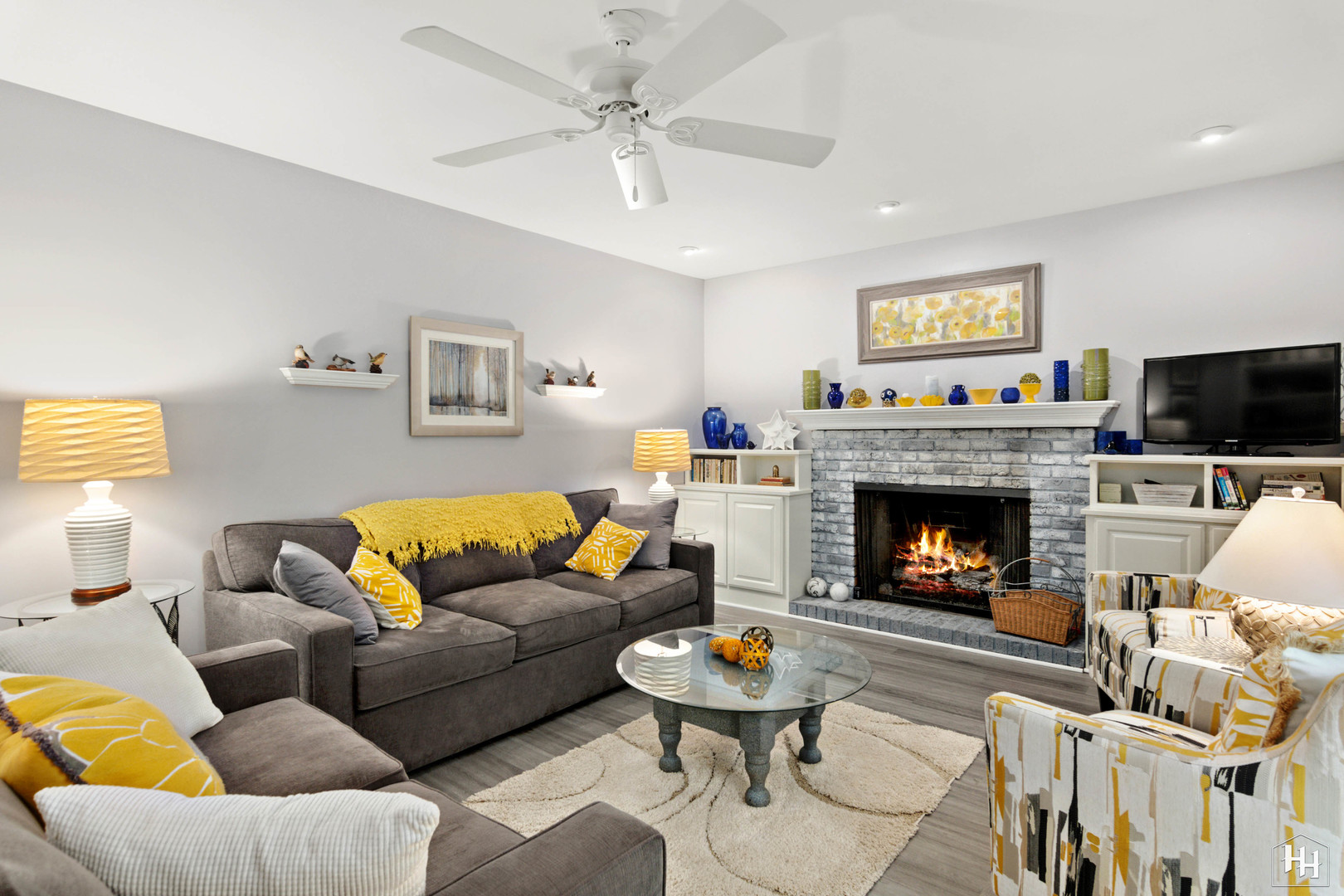 2275 Tara Drive Elgin, IL 60123 - Photo 2 of 33 a living room with furniture and a fireplace