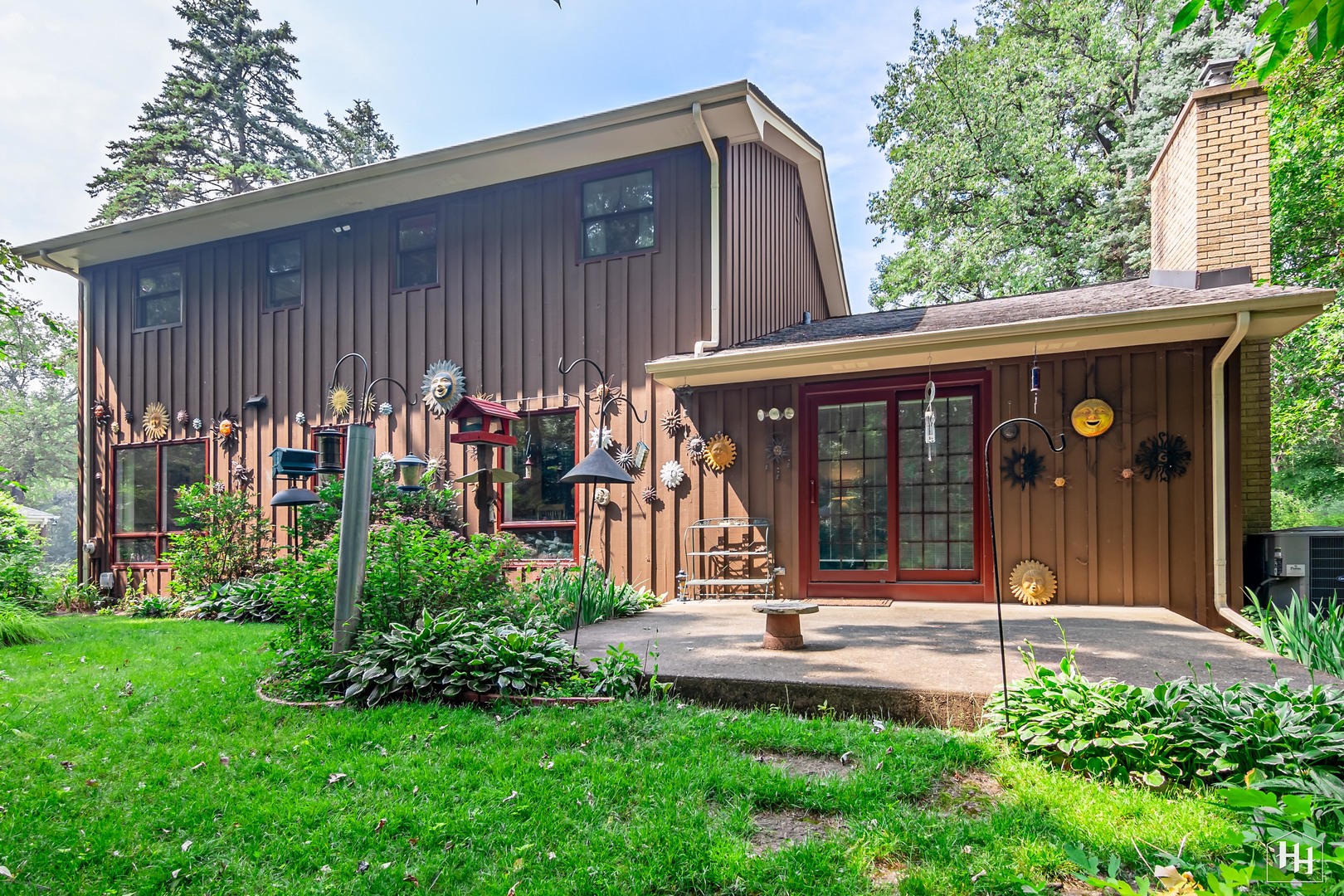 2275 Tara Drive Elgin, IL 60123 - Photo 29 of 33 a view of a house with a small yard and plants