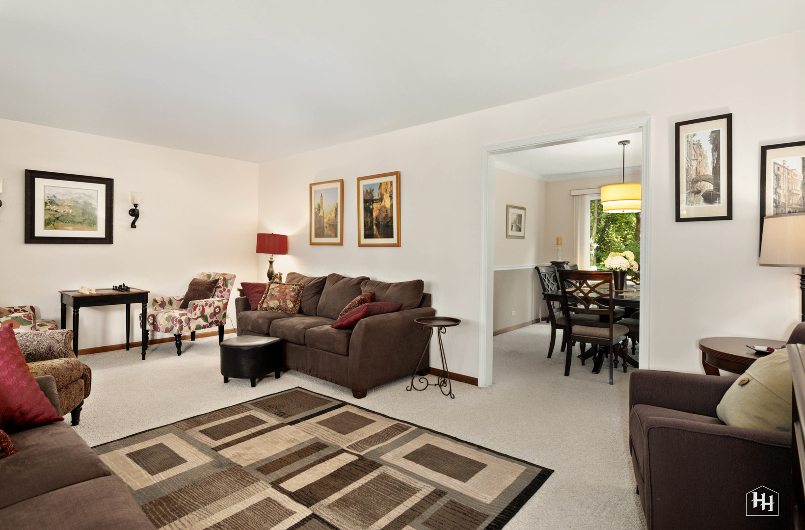 2275 Tara Drive Elgin, IL 60123 - Photo 7 of 33 a living room with furniture a rug and a table