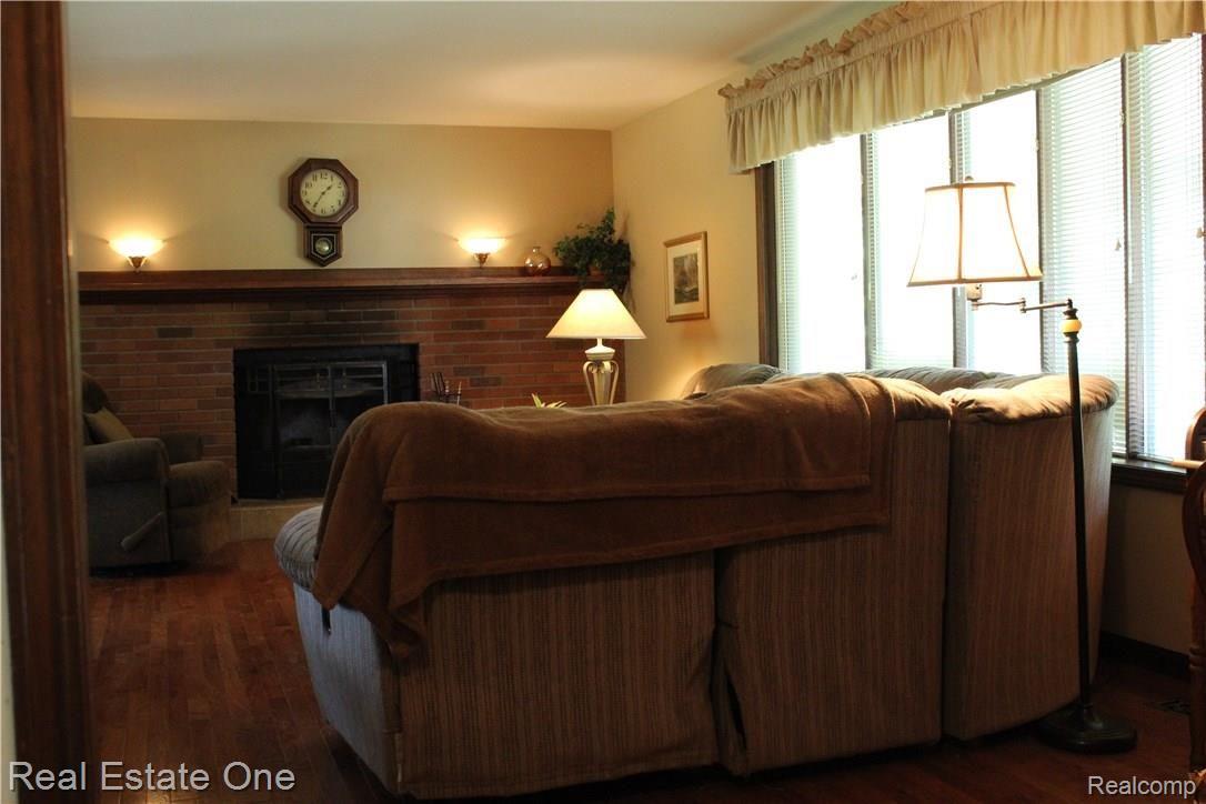 6474 Byron Road Howell, MI 48855 - Photo 26 of 62 HARDWOOD FLOORS IN THE MAIN LIVING AREA.