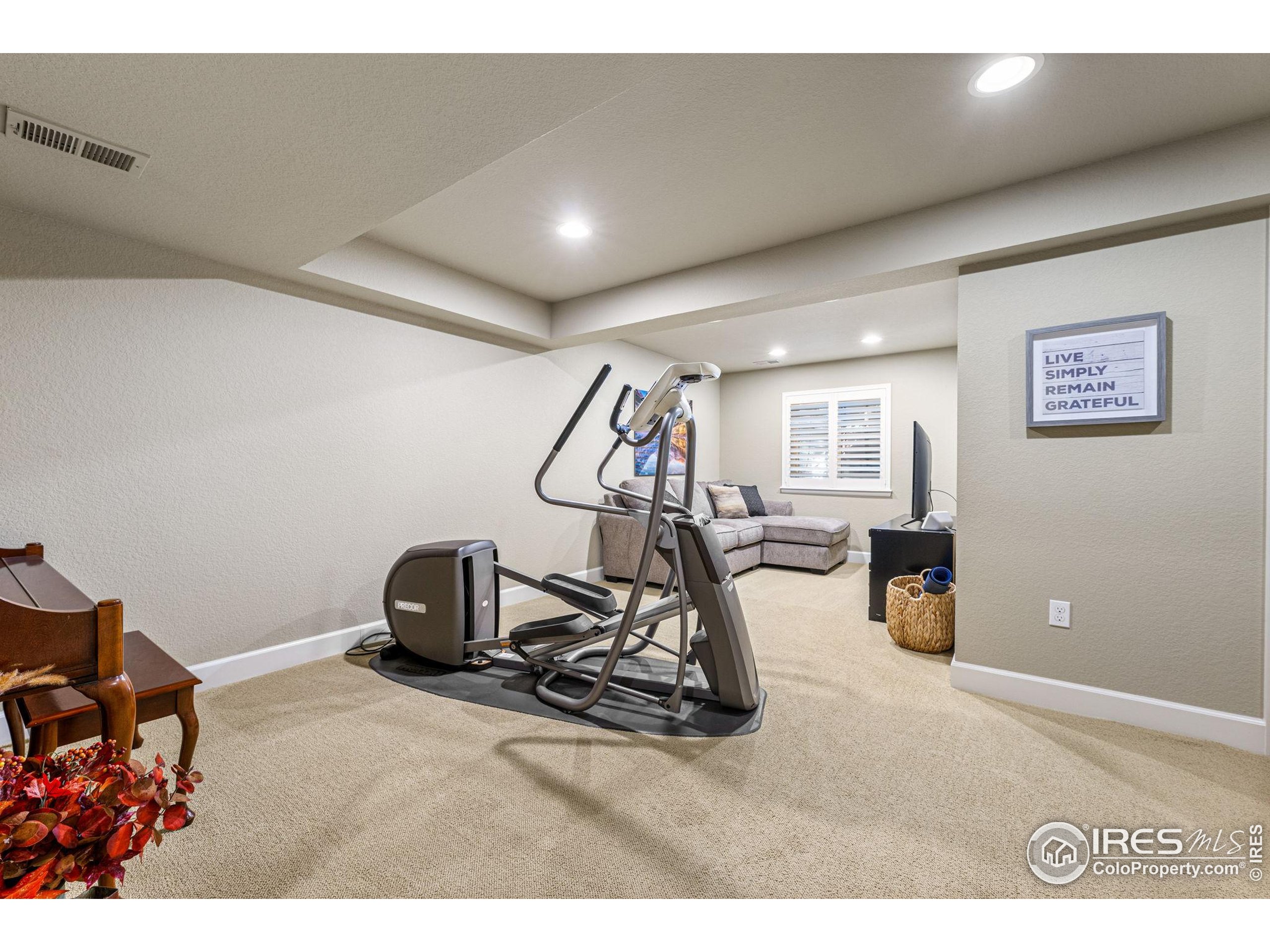 41 Quince Street Denver, CO 80230 - Photo 28 of 48 a view of a room with gym equipment