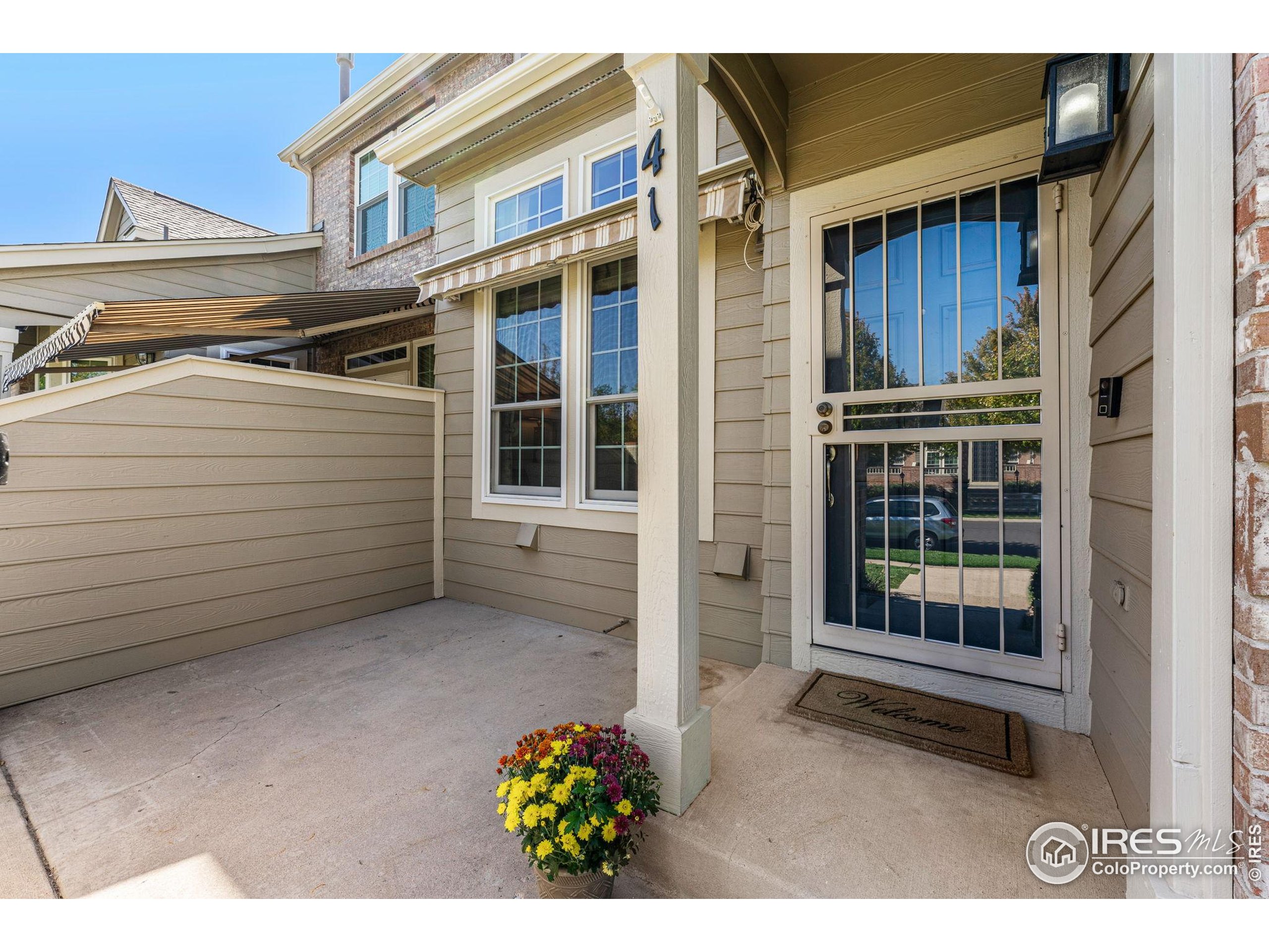 41 Quince Street Denver, CO 80230 - Photo 44 of 48 a view of a house with a window and wooden fence