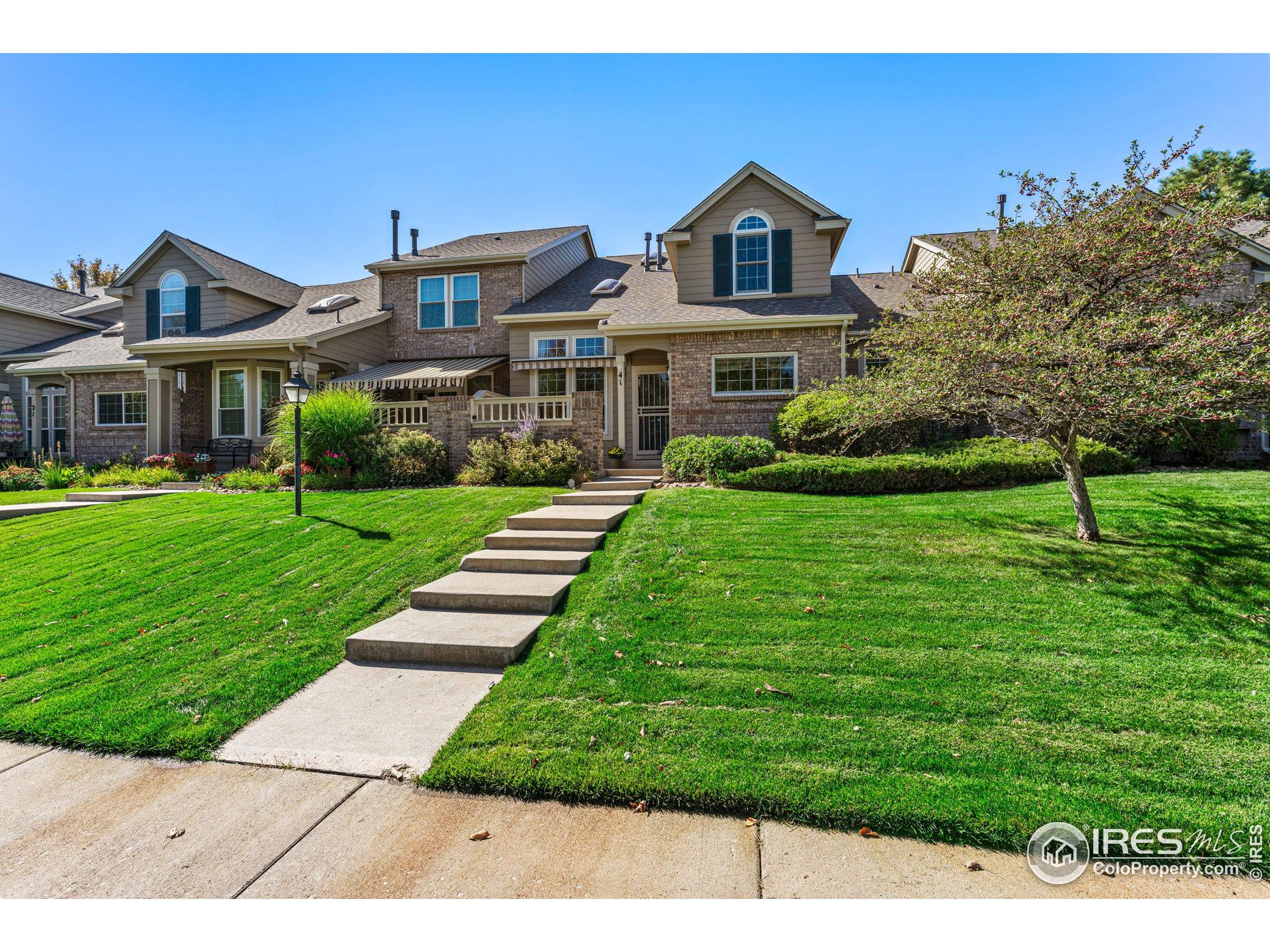 41 Quince Street Denver, CO 80230 - Photo 45 of 48 a front view of a house with a yard