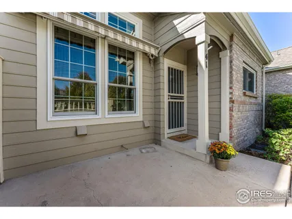 a view of outdoor space and front view of a house