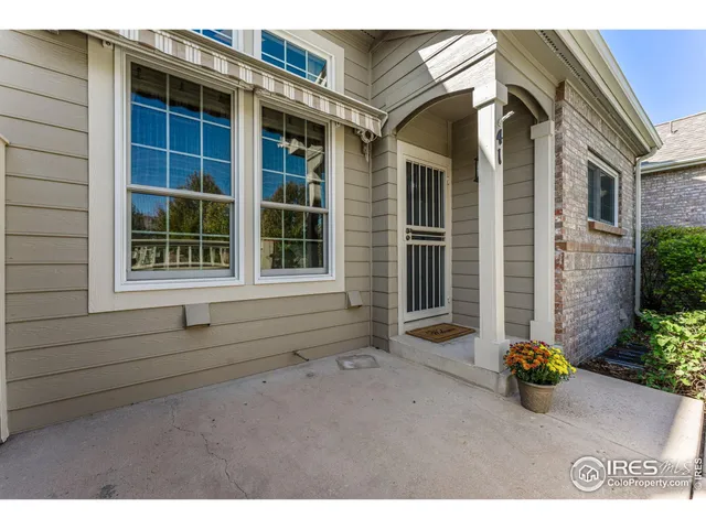 a view of outdoor space and front view of a house