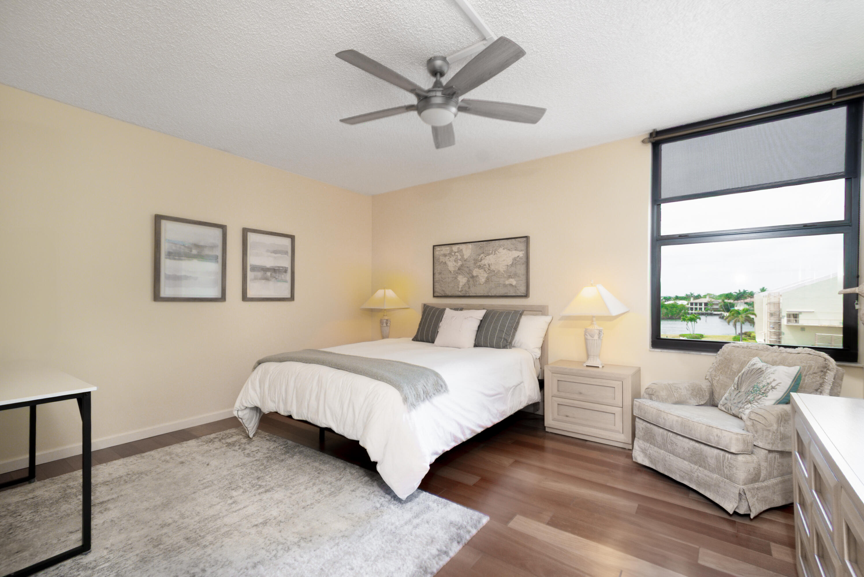 4748 South Ocean Boulevard, Unit 4B Highland Beach, FL 33487 - Photo 13 of 56 a bedroom with a bed couch and window