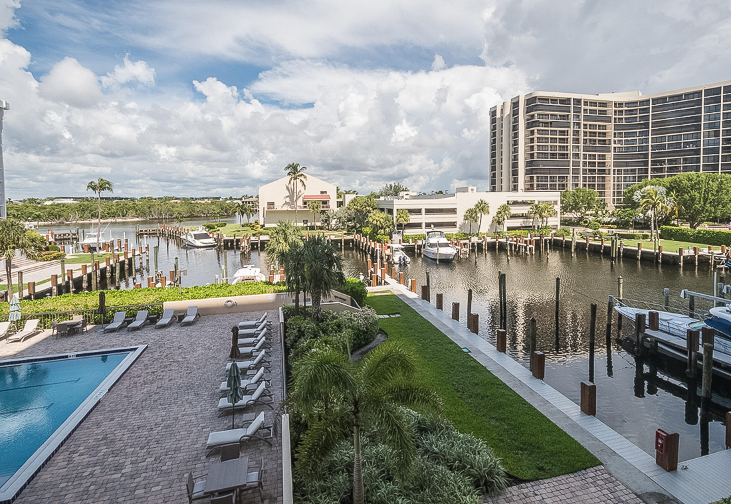 4748 South Ocean Boulevard, Unit 4B Highland Beach, FL 33487 - Photo 16 of 56 a city view with boat and water view