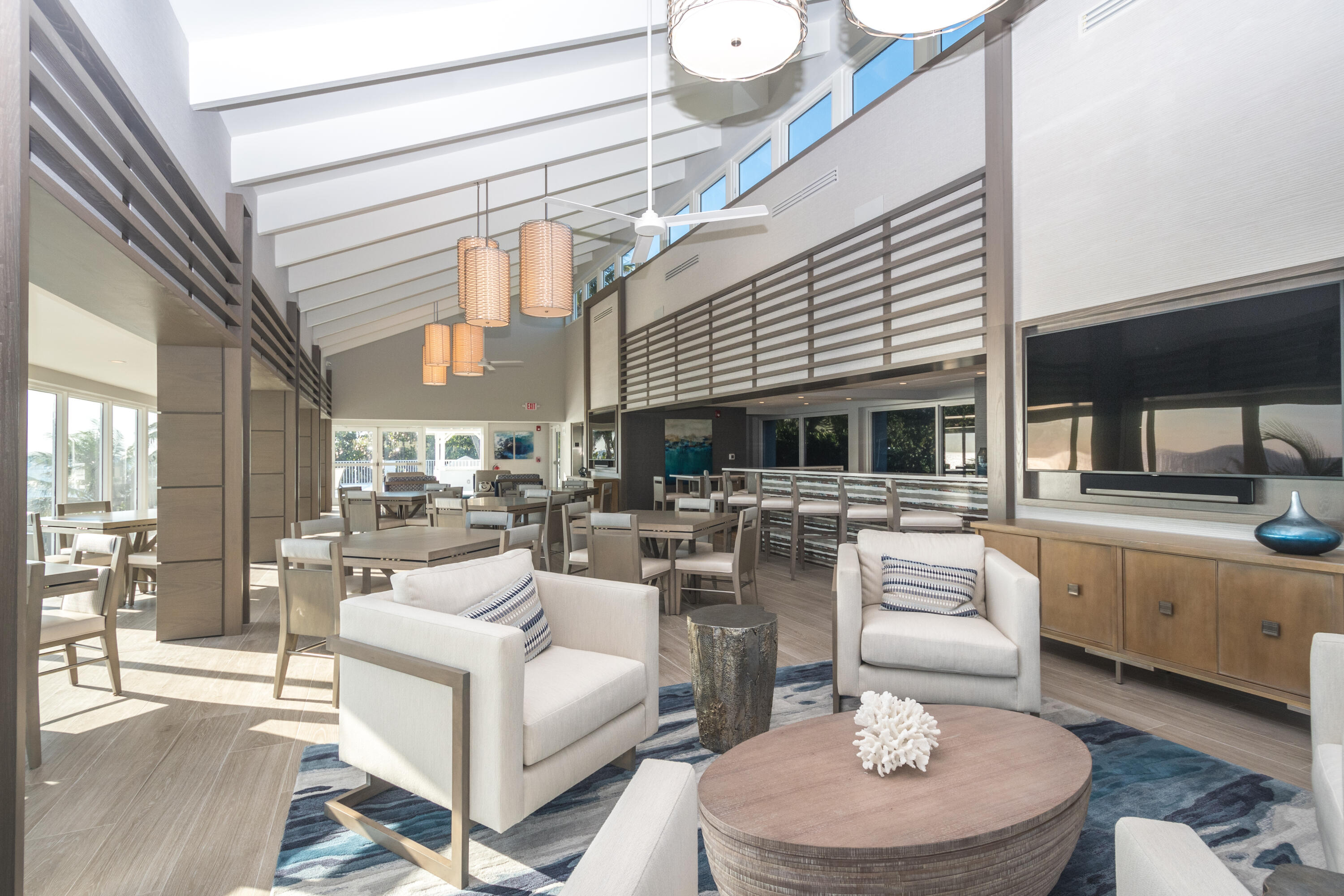 4748 South Ocean Boulevard, Unit 4B Highland Beach, FL 33487 - Photo 2 of 56 a living room with furniture and a large window